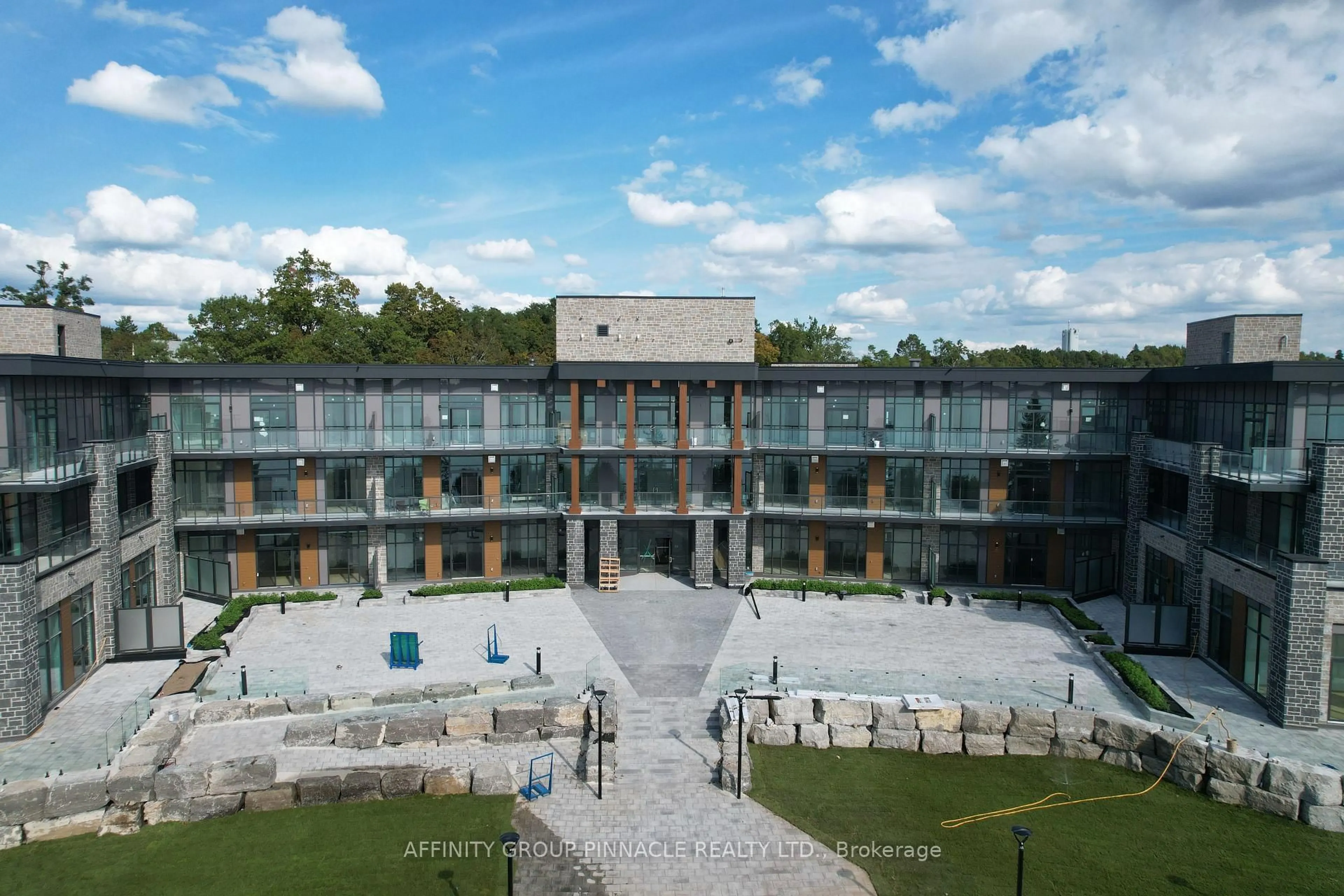 A pic from outside/outdoor area/front of a property/back of a property/a pic from drone, building for 99 Louisa St #309, Kawartha Lakes Ontario K0M 1N0