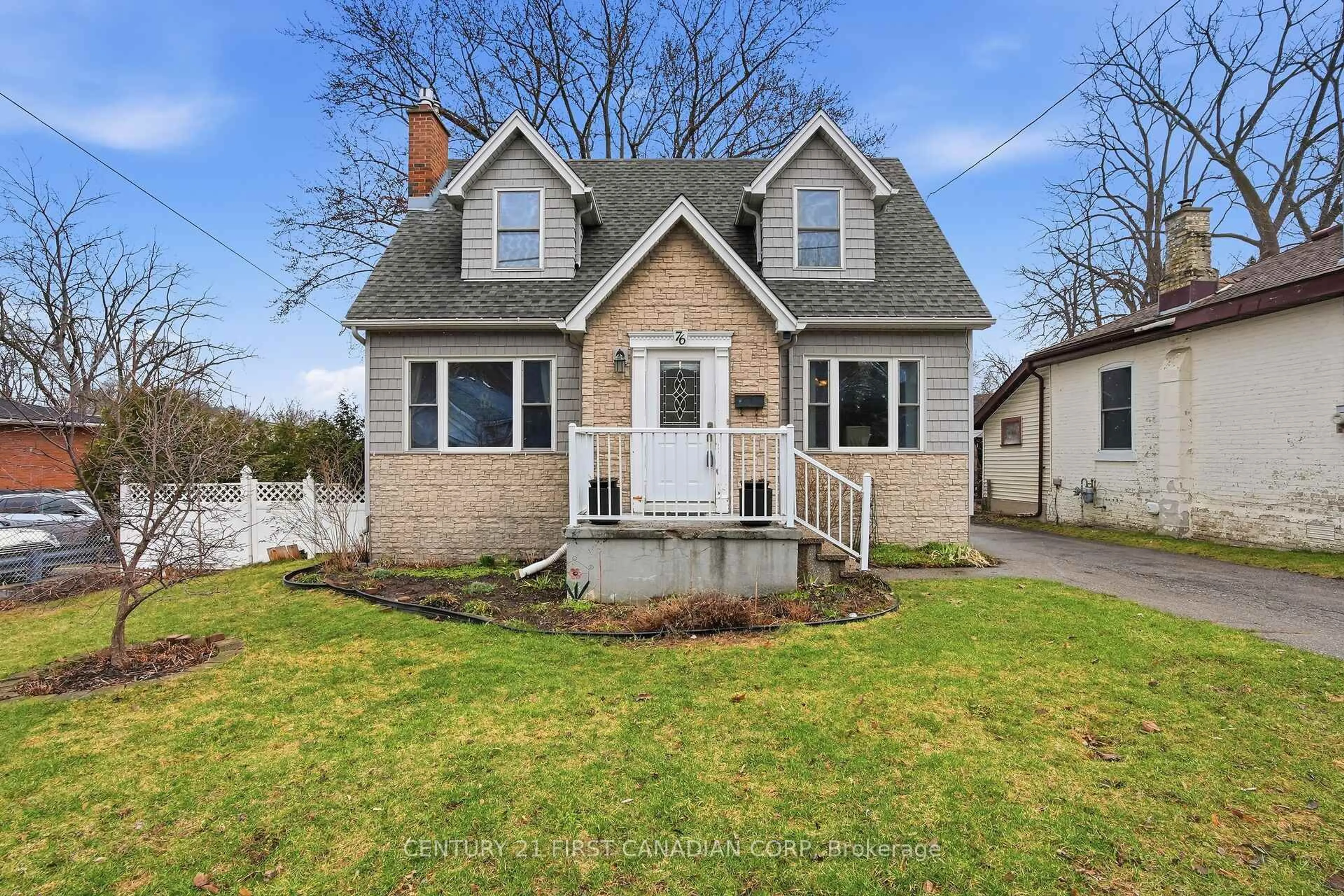 Home with vinyl exterior material, street for 76 High St, London South Ontario N6C 4J9