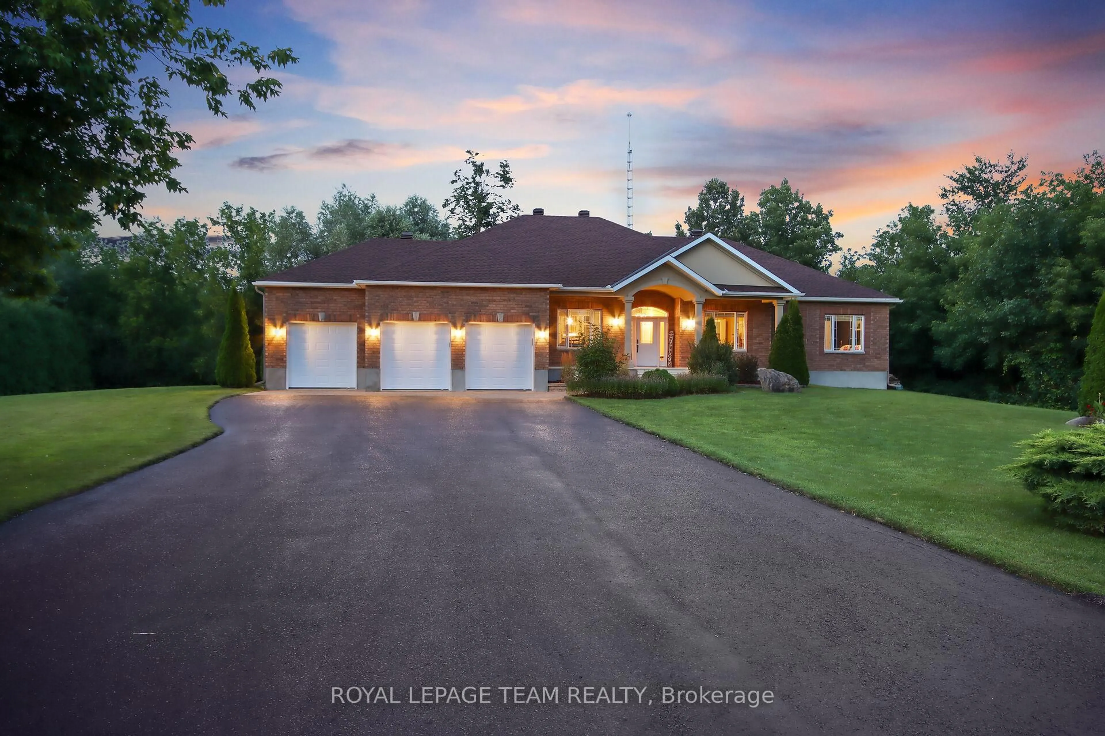 A pic from outside/outdoor area/front of a property/back of a property/a pic from drone, water/lake/river/ocean view for 2539 KEARNS Way, Greely Ontario K4P 1R9