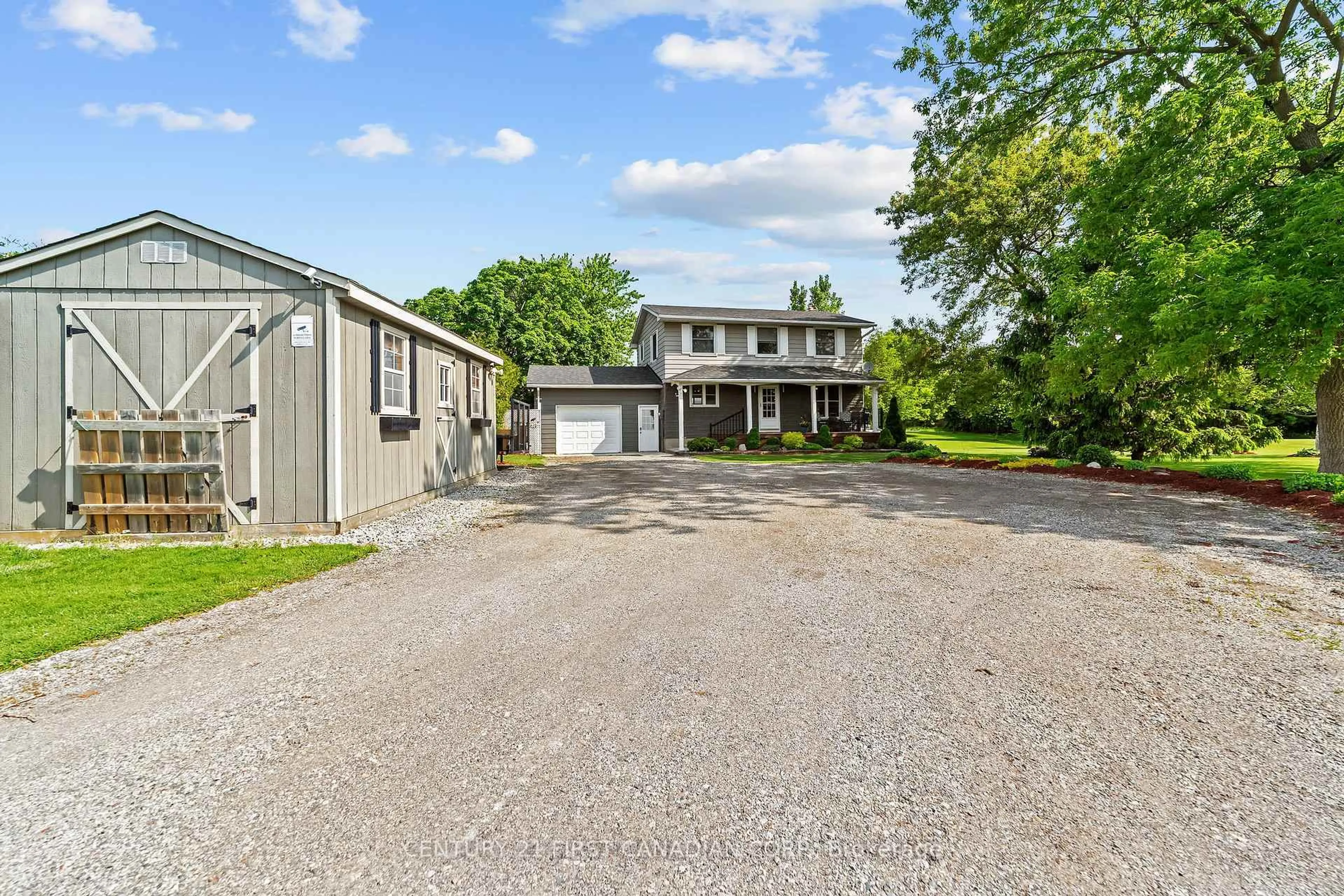 A pic from outside/outdoor area/front of a property/back of a property/a pic from drone, street for 13972 Elginfield Rd, Lucan Biddulph Ontario N0M 2J0