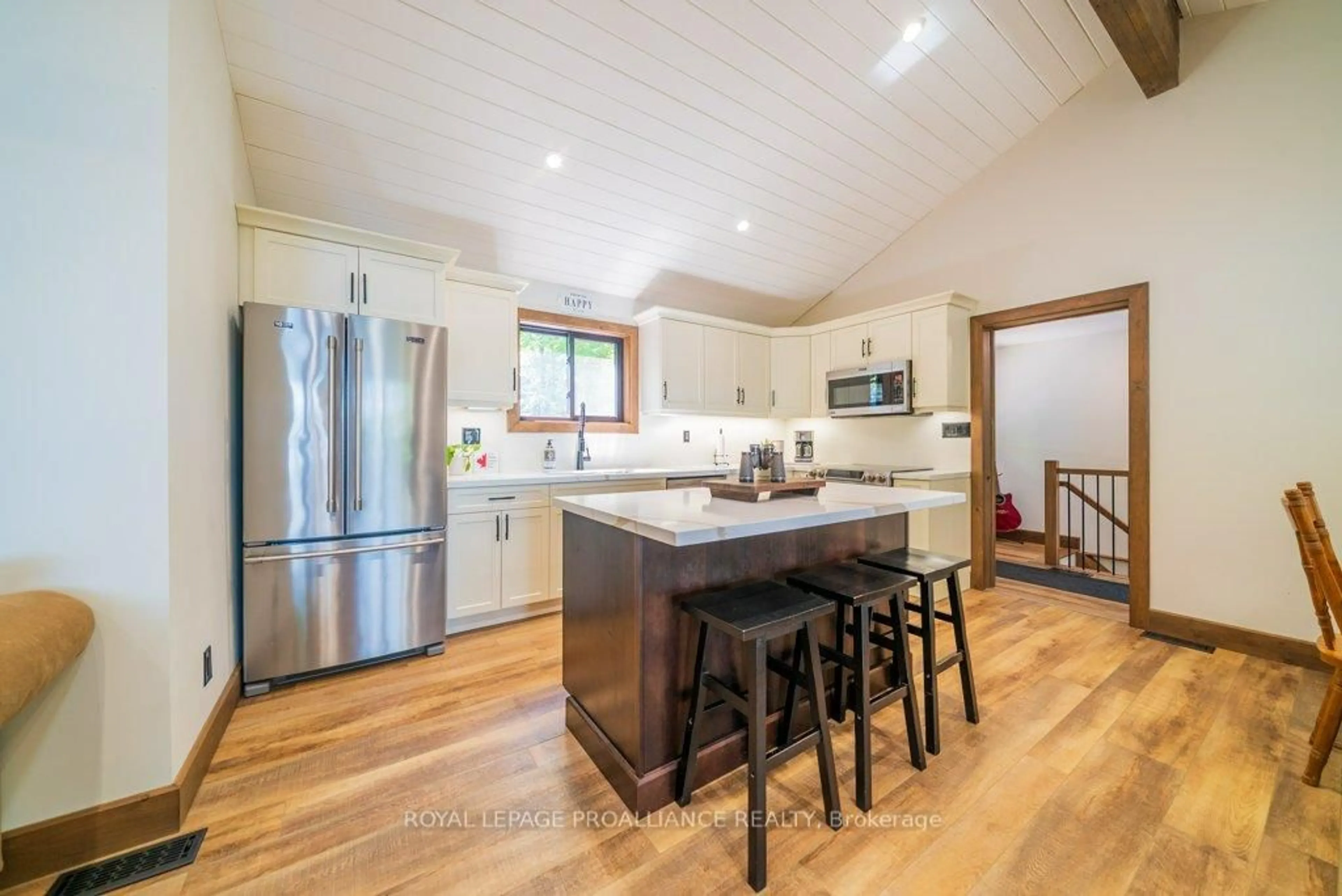 Open concept kitchen, wood/laminate floor for 1202 Rocky Lane, Cloyne Ontario K0H 1K0