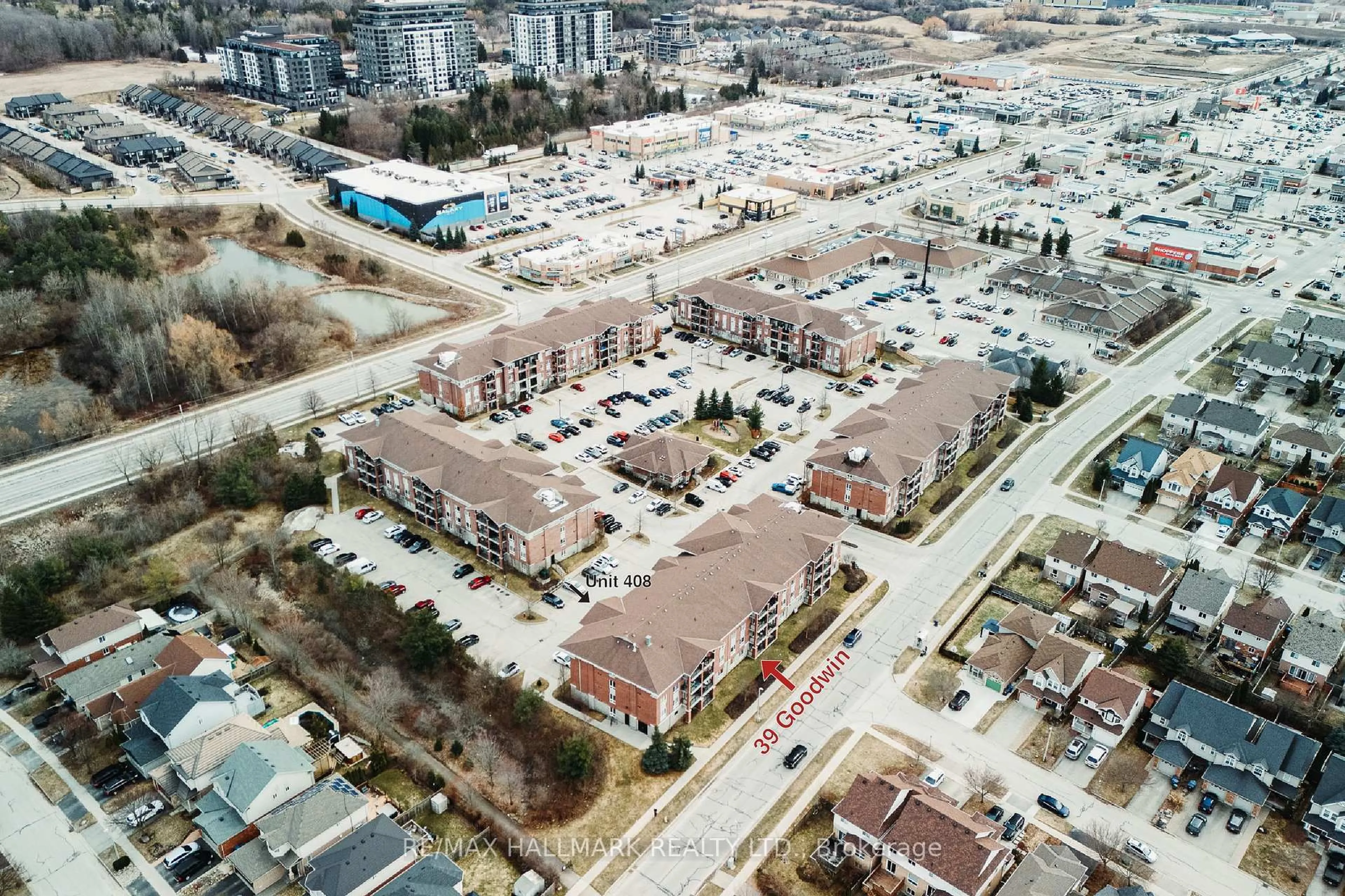 A pic from outside/outdoor area/front of a property/back of a property/a pic from drone, street for 39 Goodwin Dr #408, Guelph Ontario N1L 0E5
