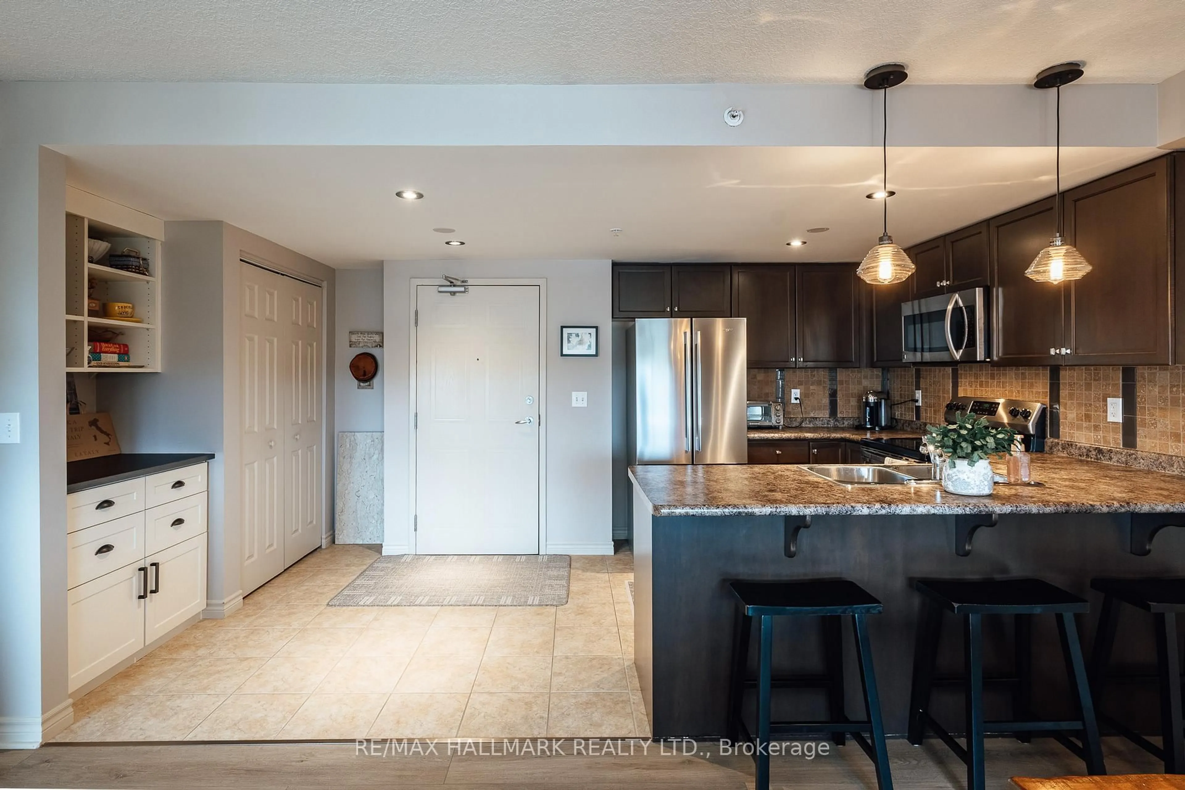 Open concept kitchen, ceramic/tile floor for 39 Goodwin Dr #408, Guelph Ontario N1L 0E5