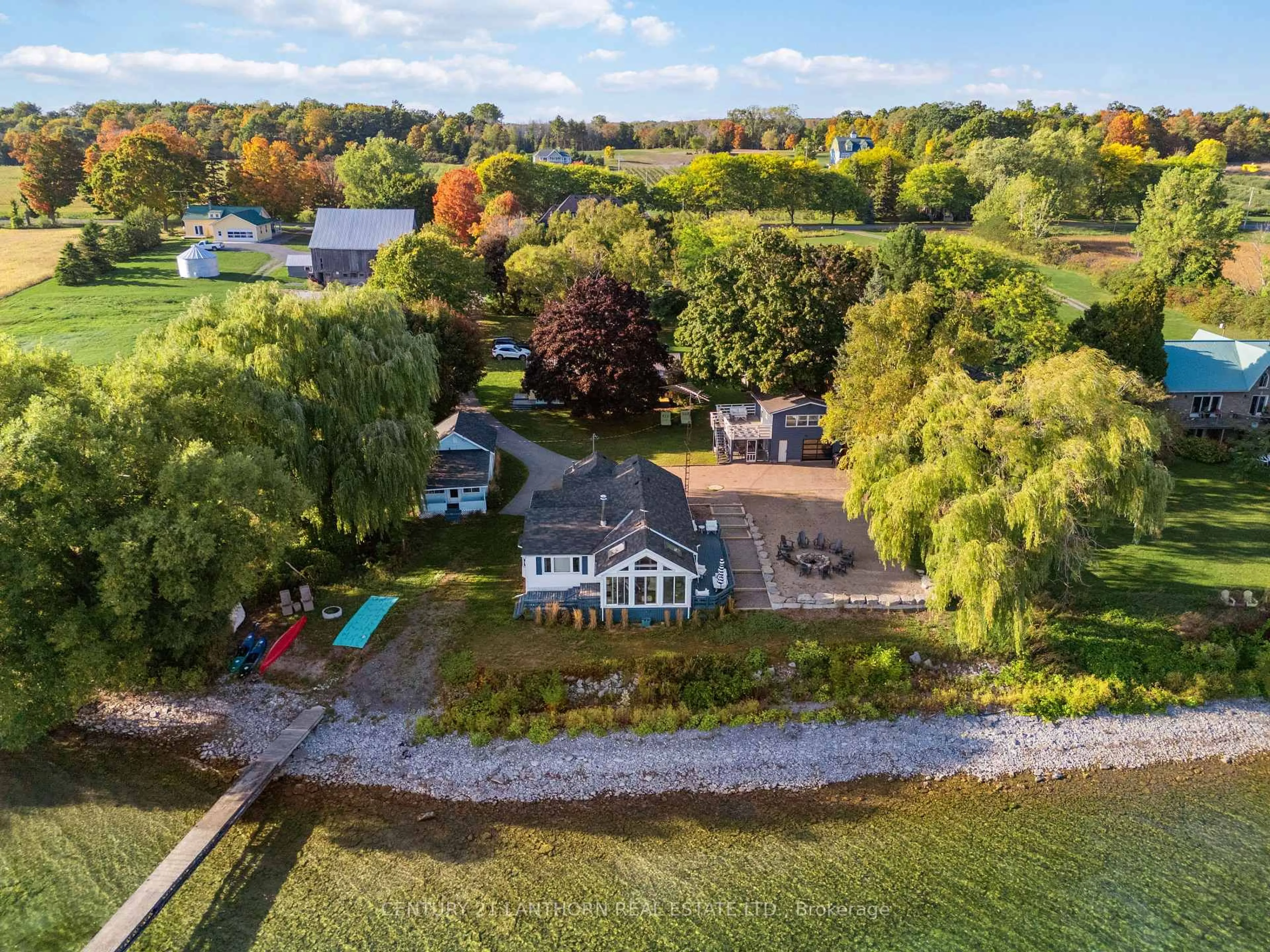 A pic from outside/outdoor area/front of a property/back of a property/a pic from drone, water/lake/river/ocean view for 2924 County Road 8, Prince Edward County Ontario K0K 2T0