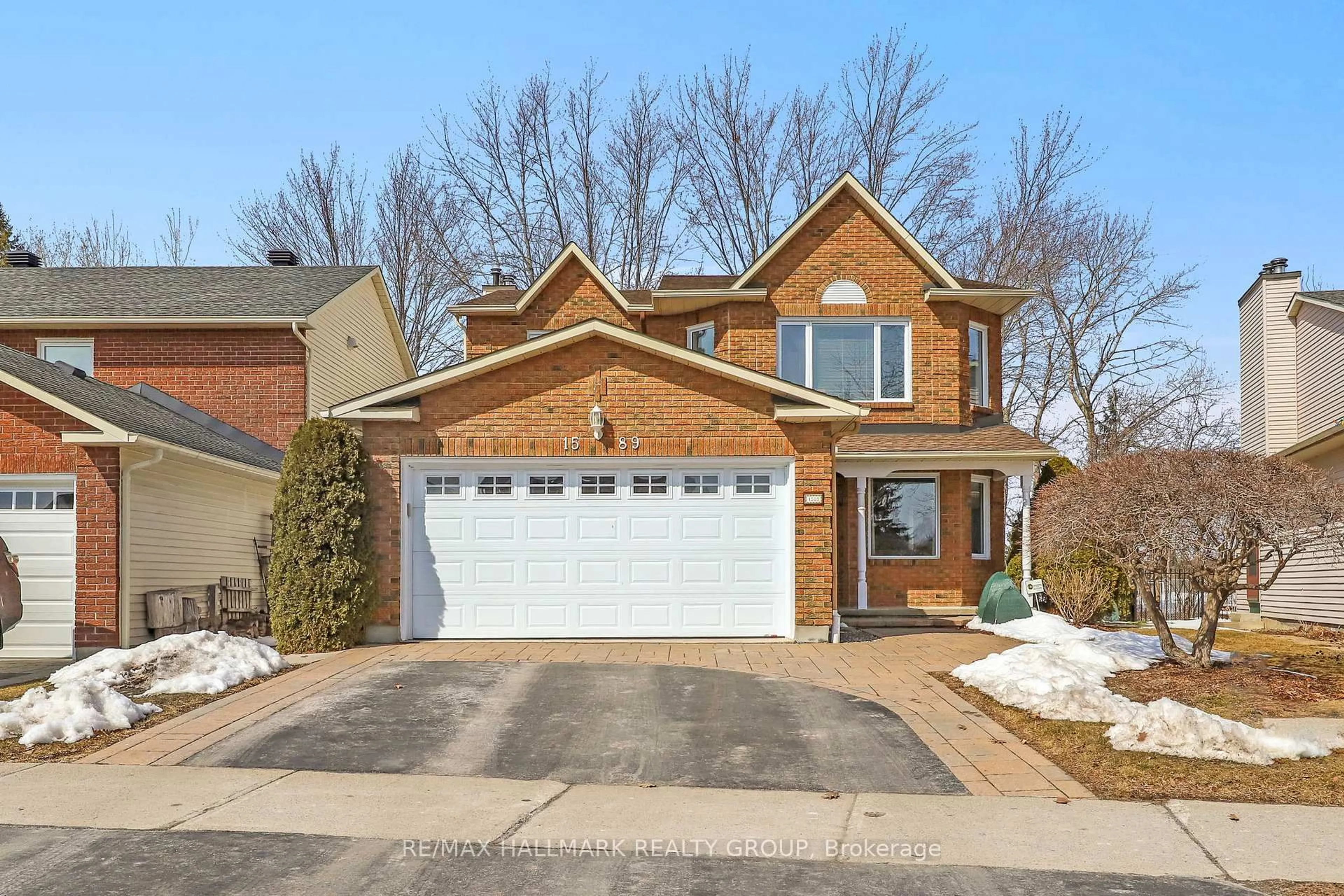 Home with brick exterior material, street for 1589 Champneuf Dr, Orleans Ontario K1C 6B6