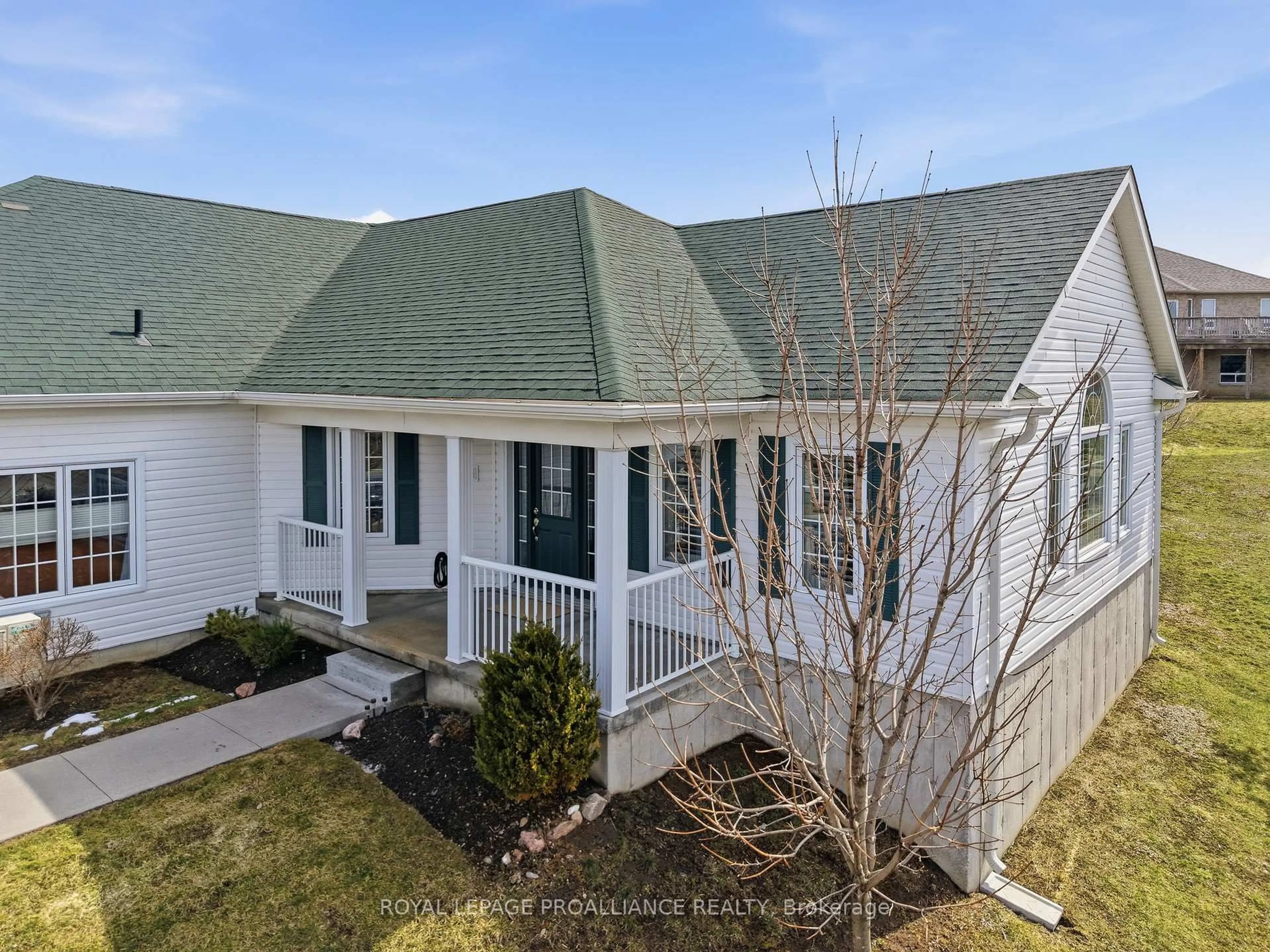 A pic from outside/outdoor area/front of a property/back of a property/a pic from drone, unknown for 295 Densmore Rd #404, Cobourg Ontario K9A 2S7