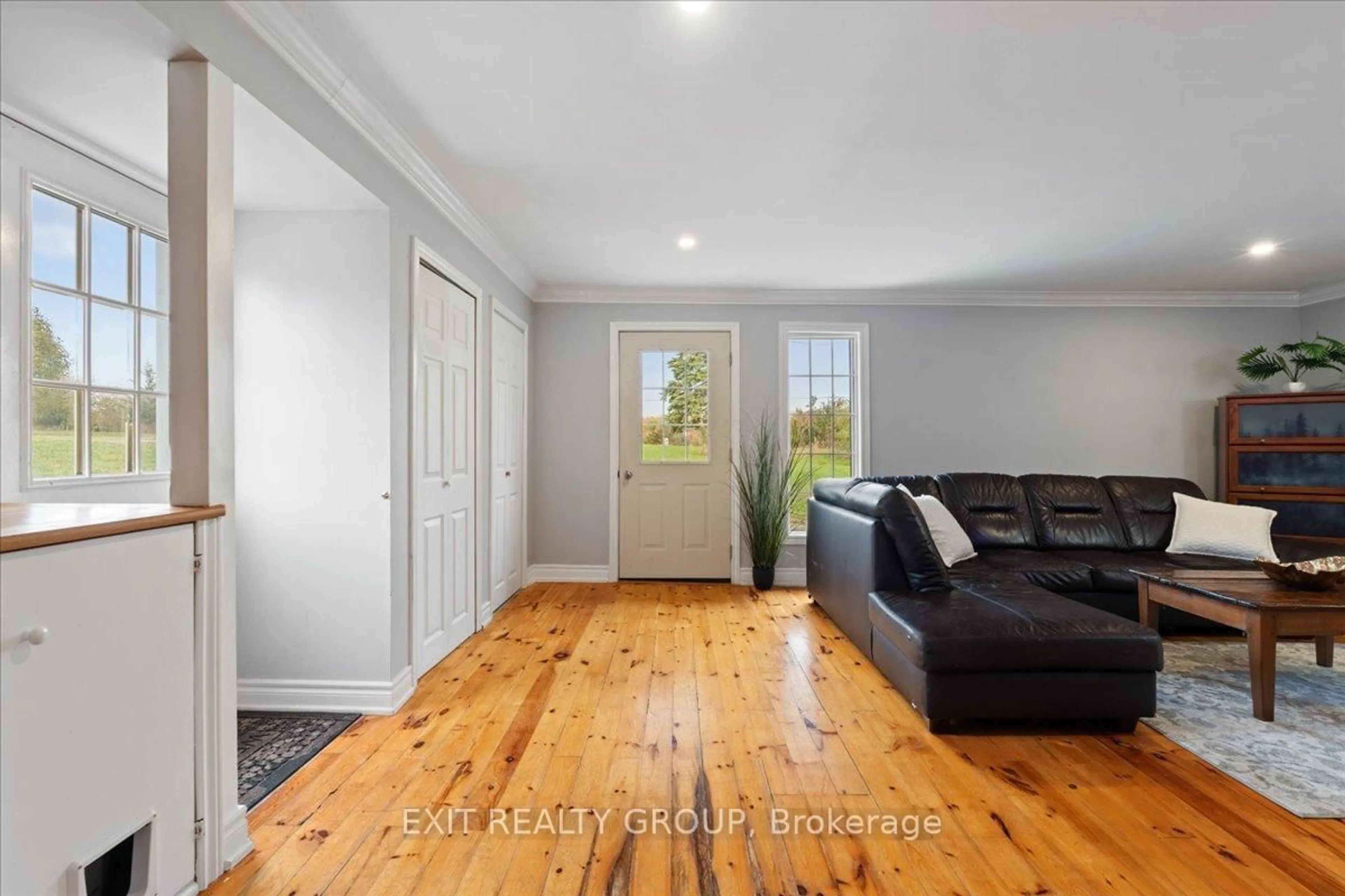 Living room with furniture, wood/laminate floor for 895 English Settlement Rd, Trenton Ontario K8V 5P7