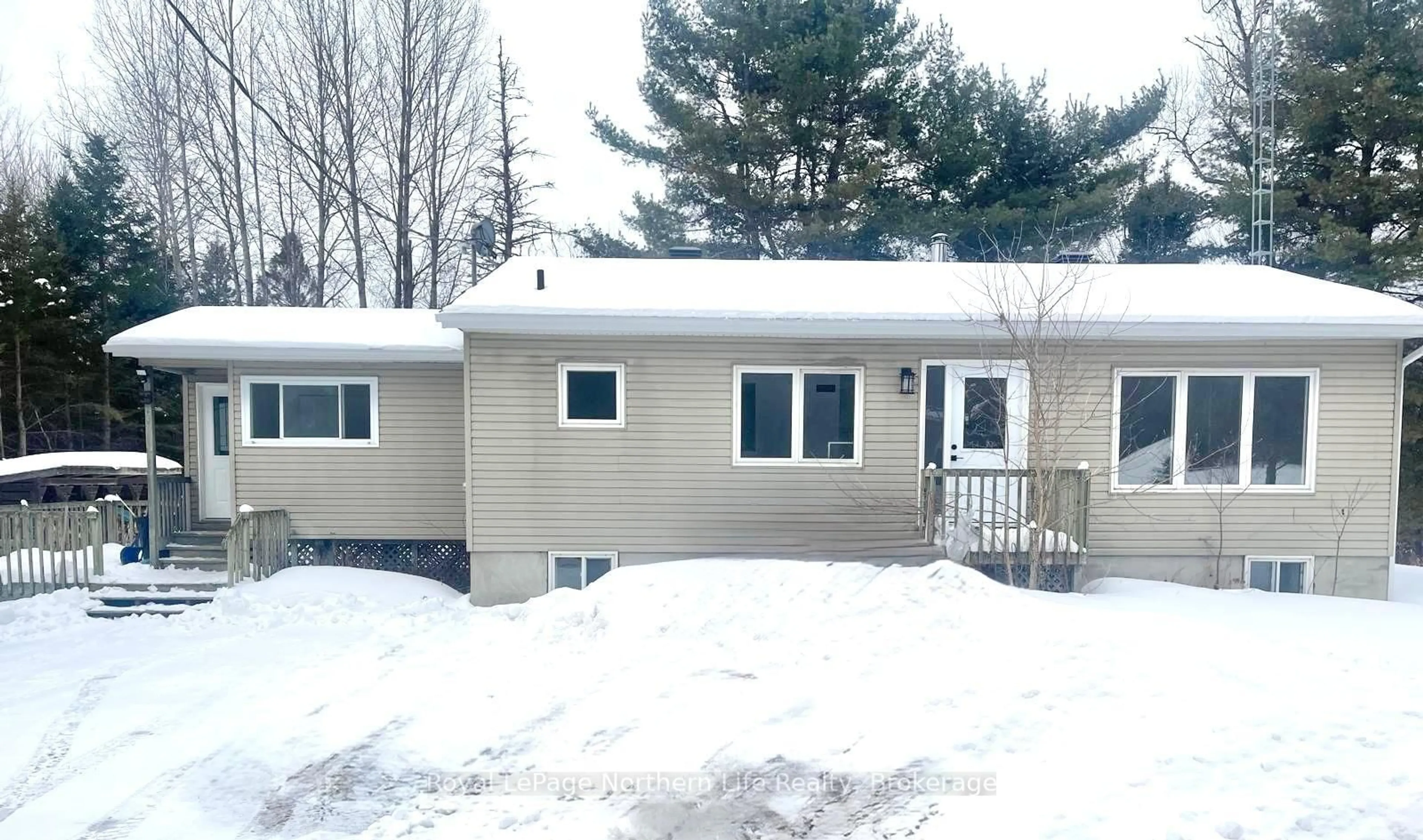 Home with vinyl exterior material, street for 245 JODOUIN Rd, Papineau-Cameron Ontario P0H 1V0