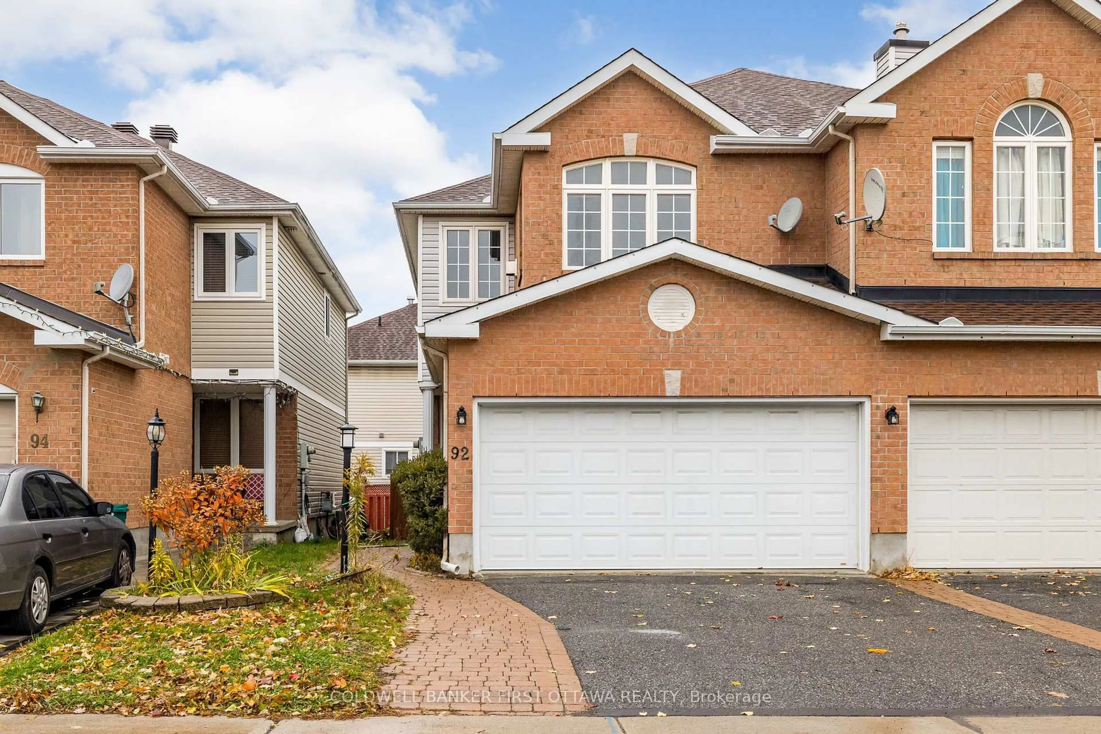 Home with brick exterior material, street for 92 DEERFOX Dr, Ottawa Ontario K2J 4W9