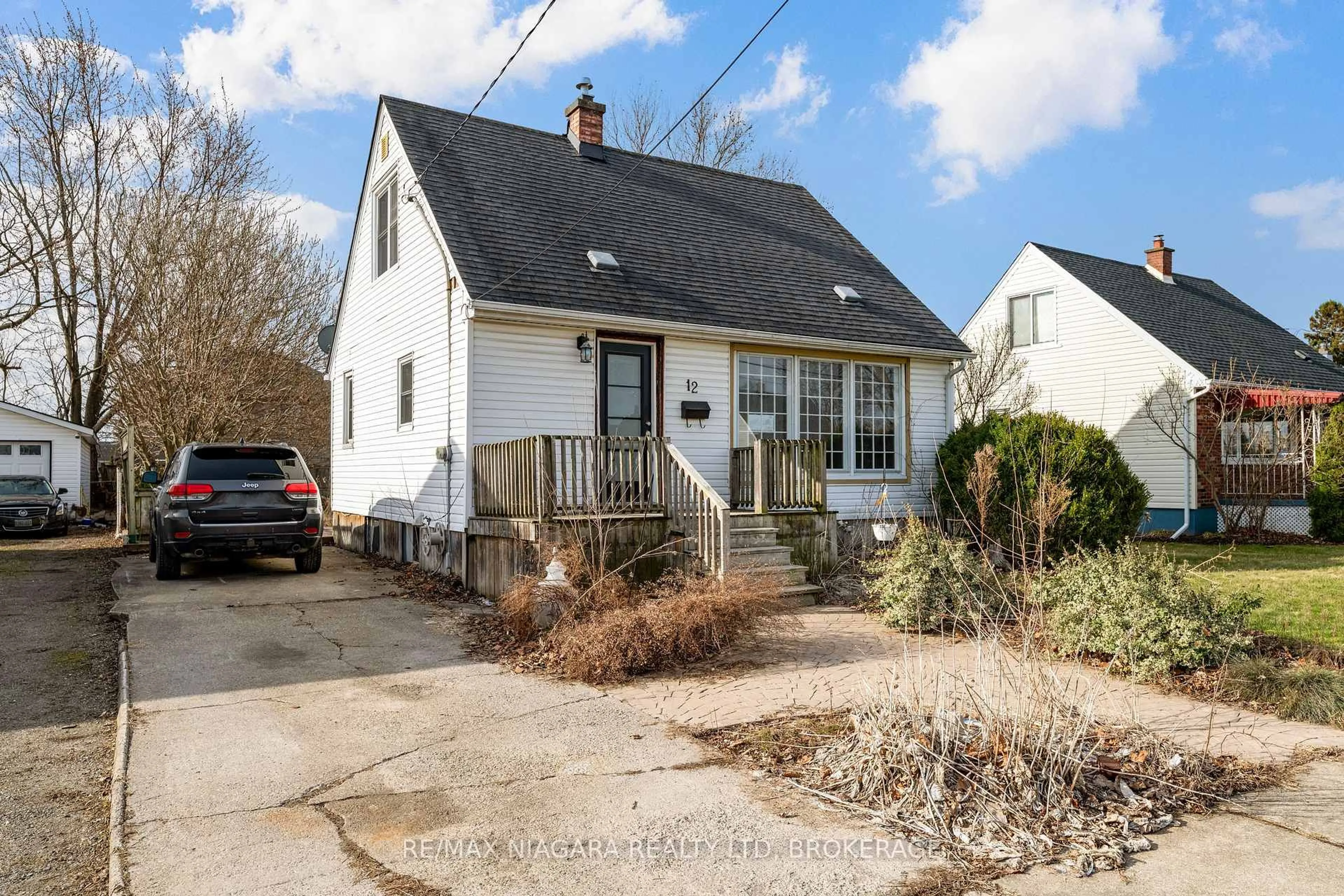 Home with vinyl exterior material, street for 12 Admiral Rd, St. Catharines Ontario L2P 1G5