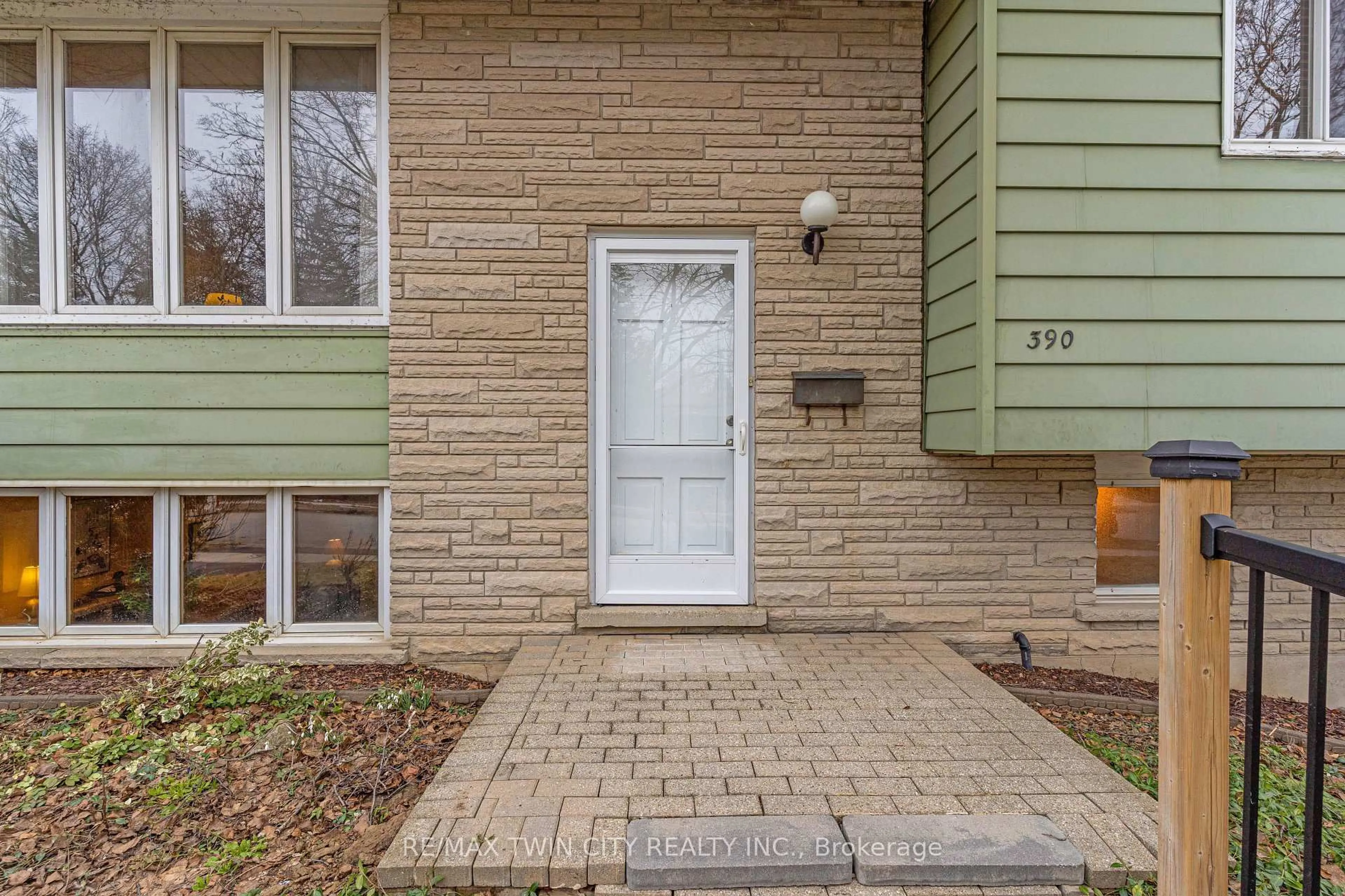 Home with brick exterior material, street for 390 Tamarack Dr, Waterloo Ontario N2L 4G6