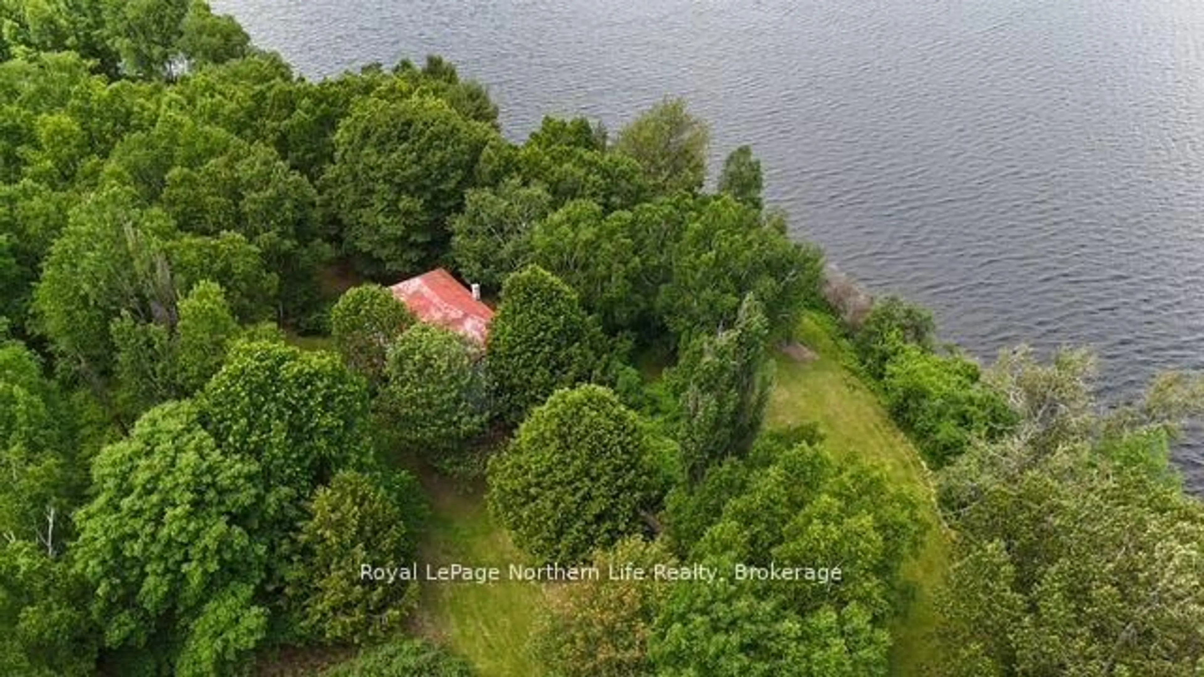 A pic from outside/outdoor area/front of a property/back of a property/a pic from drone, water/lake/river/ocean view for 106 Cedar Bay Rd, East Ferris Ontario P0H 1B0