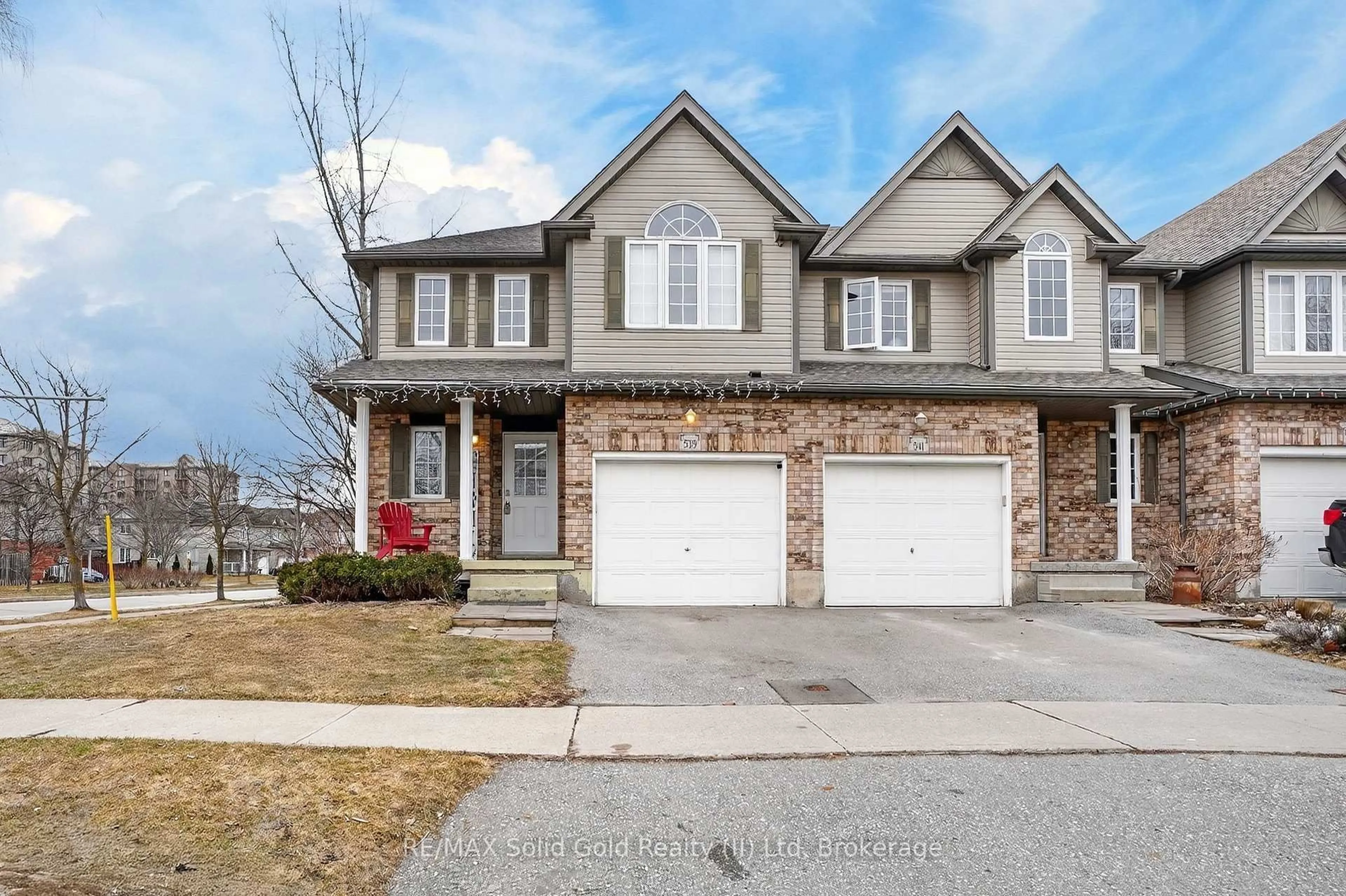 Home with brick exterior material, street for 539 Woolgrass Ave, Waterloo Ontario N2V 2Y2