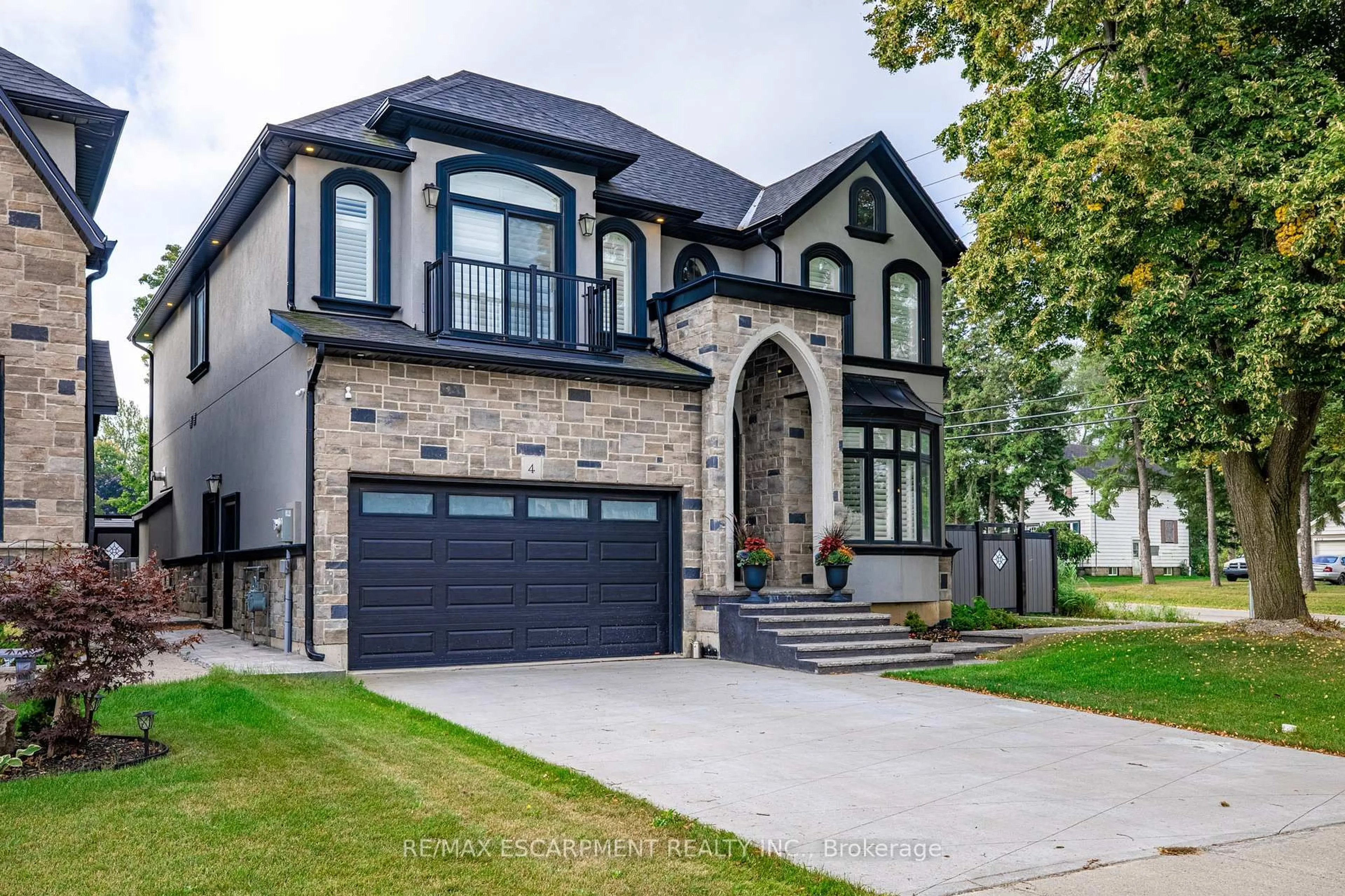 Home with brick exterior material, street for 4 LOCKMAN Dr, Hamilton Ontario L9K 0C1