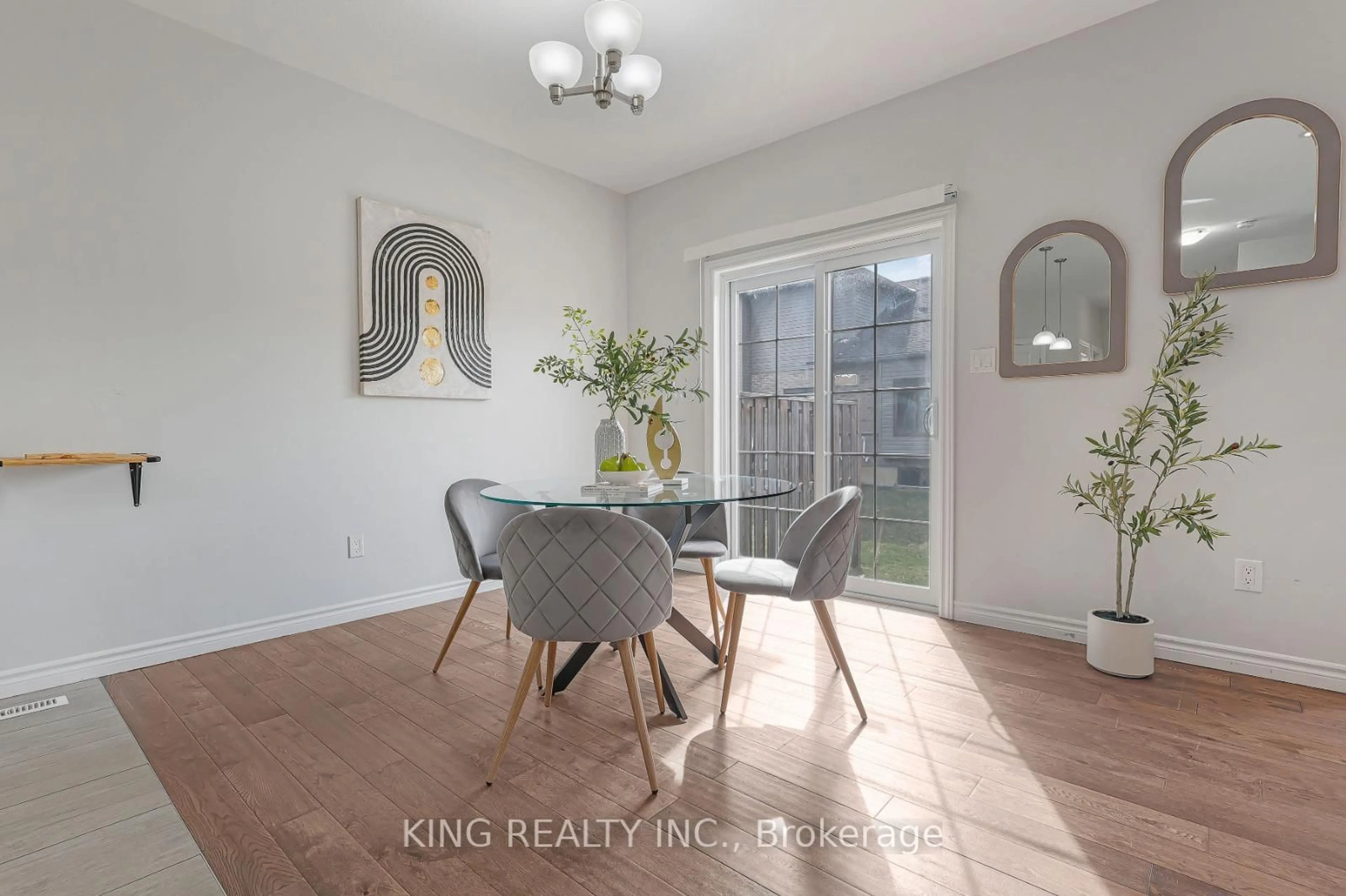 Dining room, wood/laminate floor for 2910 Tokala Tr #40, London North Ontario N6G 5B4