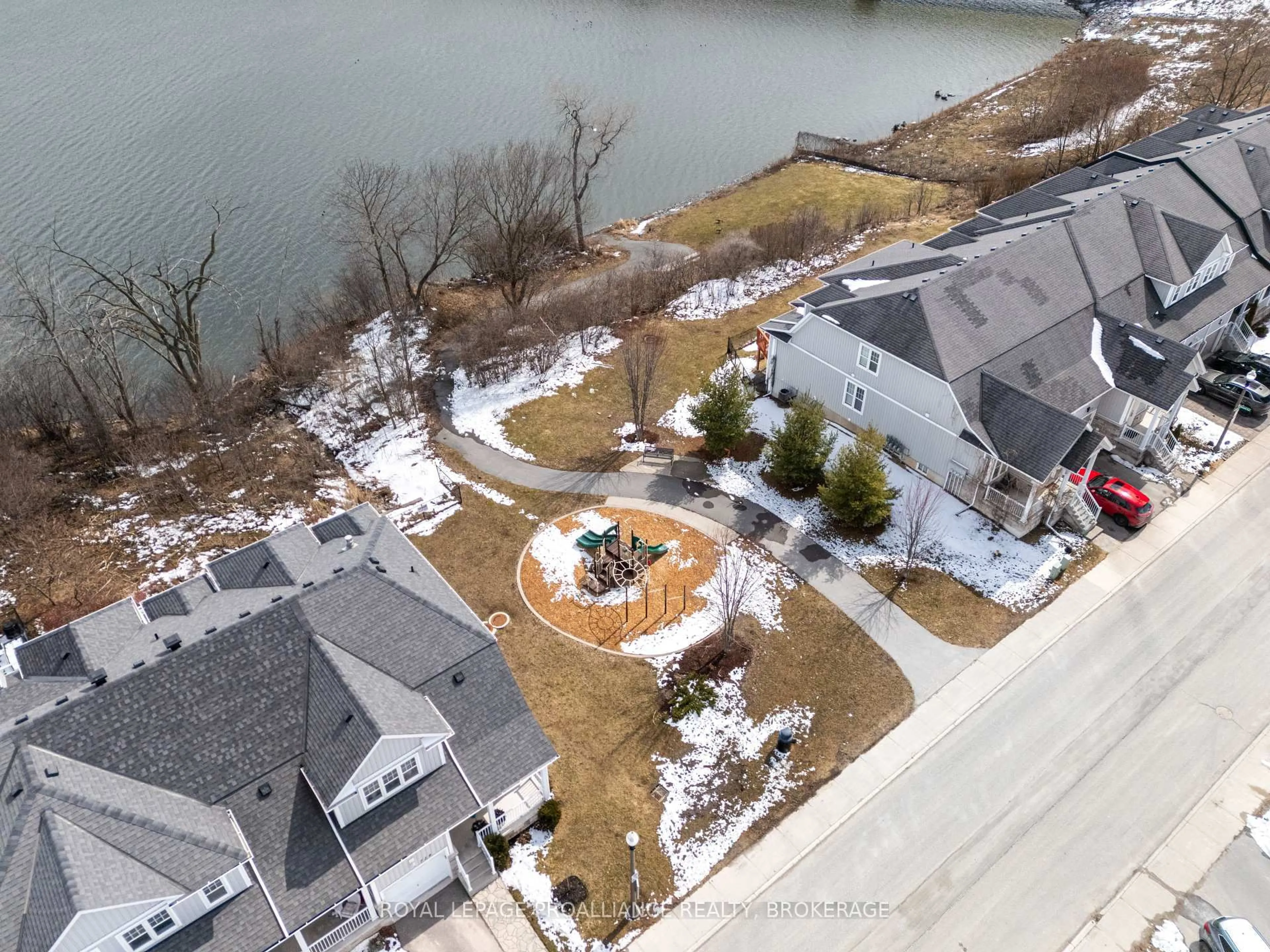 A pic from outside/outdoor area/front of a property/back of a property/a pic from drone, water/lake/river/ocean view for 831 Newmarket Lane, Kingston Ontario K7K 0C8