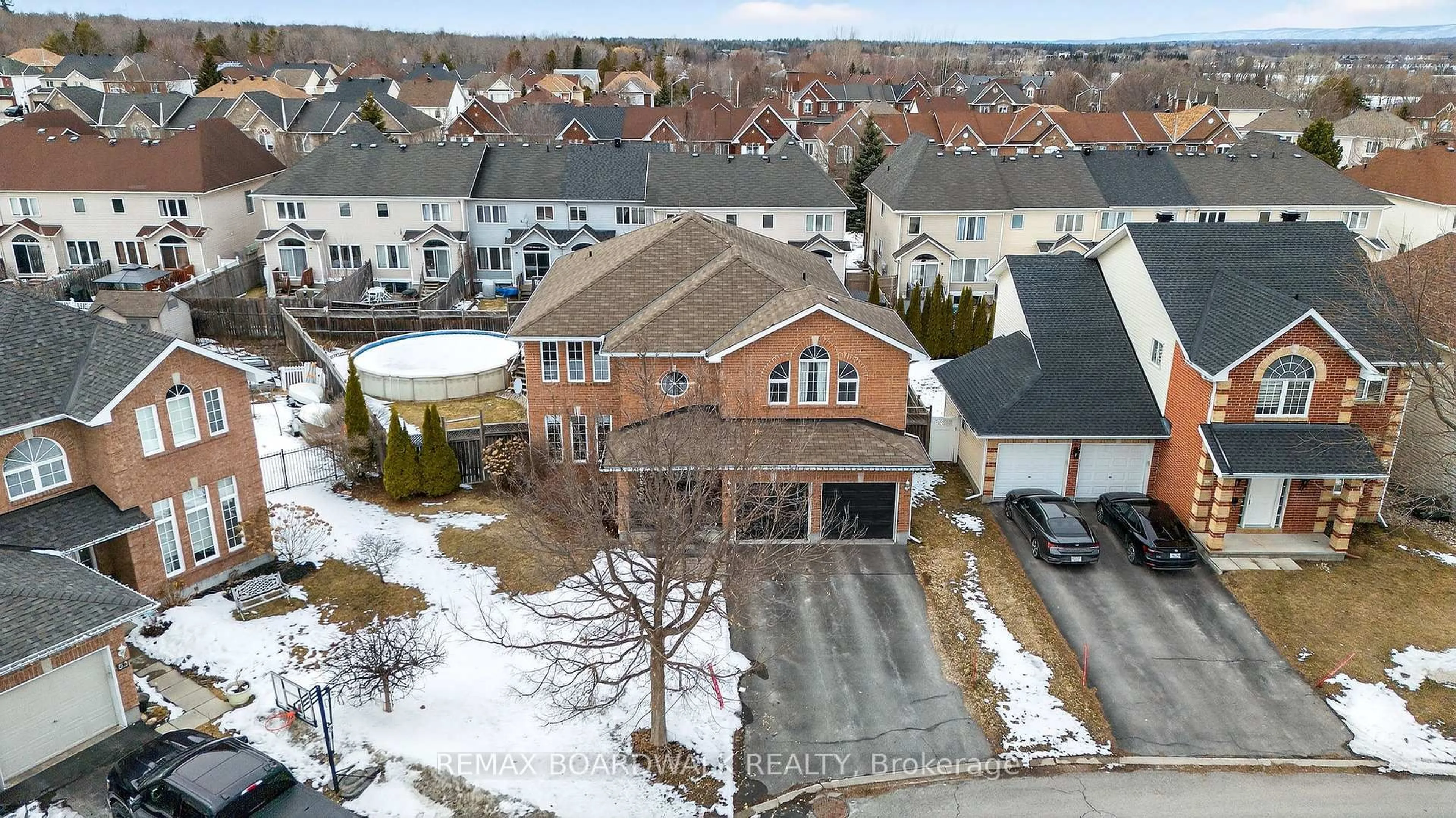 A pic from outside/outdoor area/front of a property/back of a property/a pic from drone, street for 85 Woliston Cres, Kanata Ontario K2W 1G2