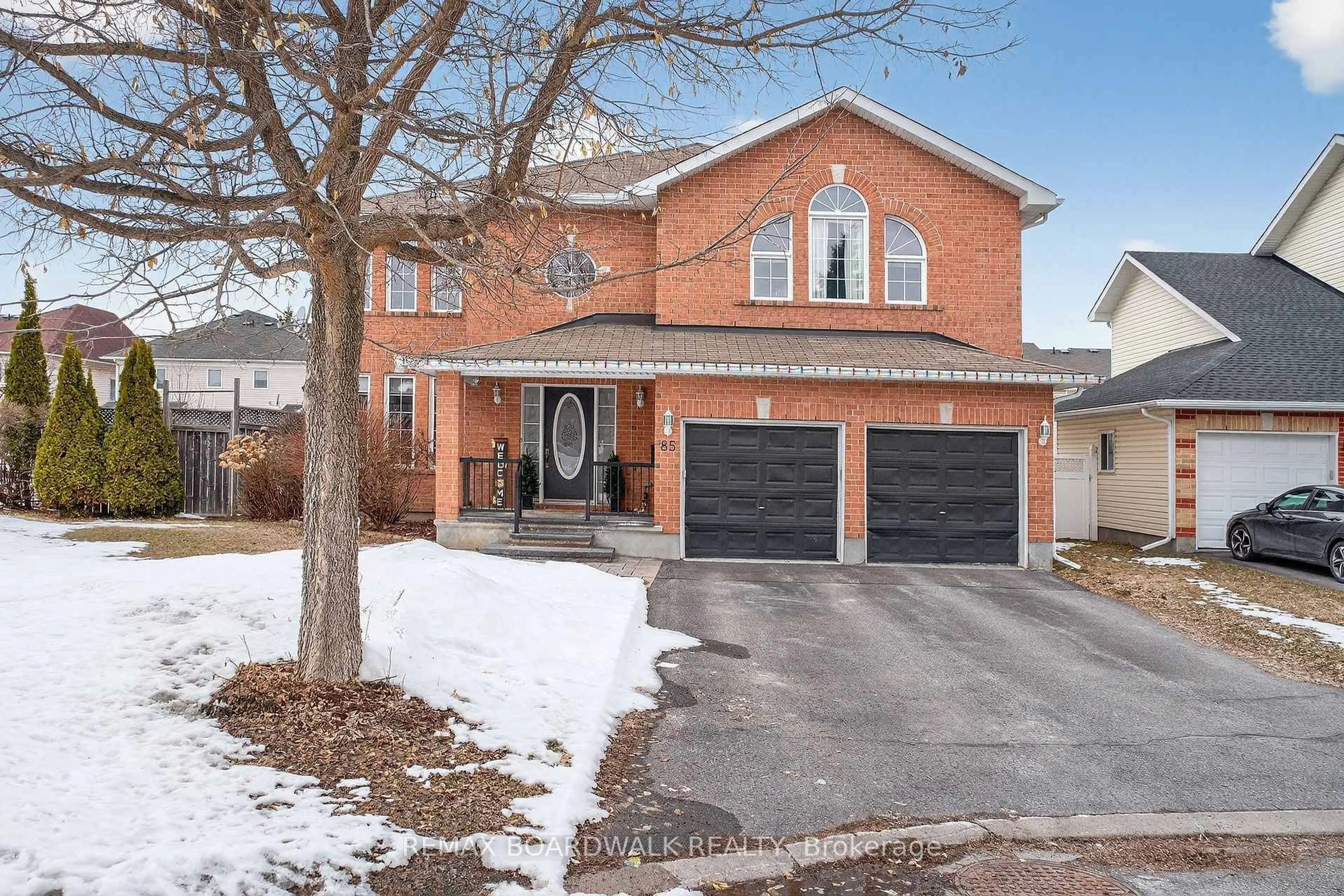 Home with brick exterior material, street for 85 Woliston Cres, Kanata Ontario K2W 1G2