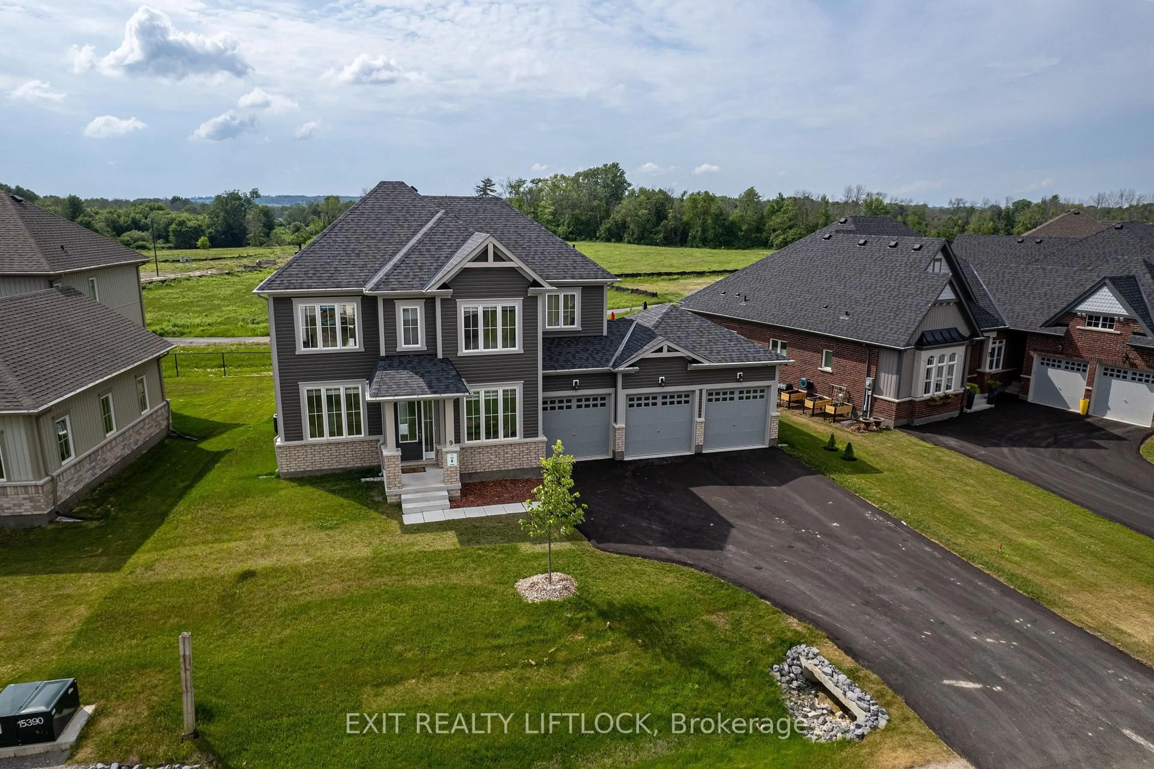 A pic from outside/outdoor area/front of a property/back of a property/a pic from drone, unknown for 9 Wishing Well Lane, Otonabee-South Monaghan Ontario K9J 0K6