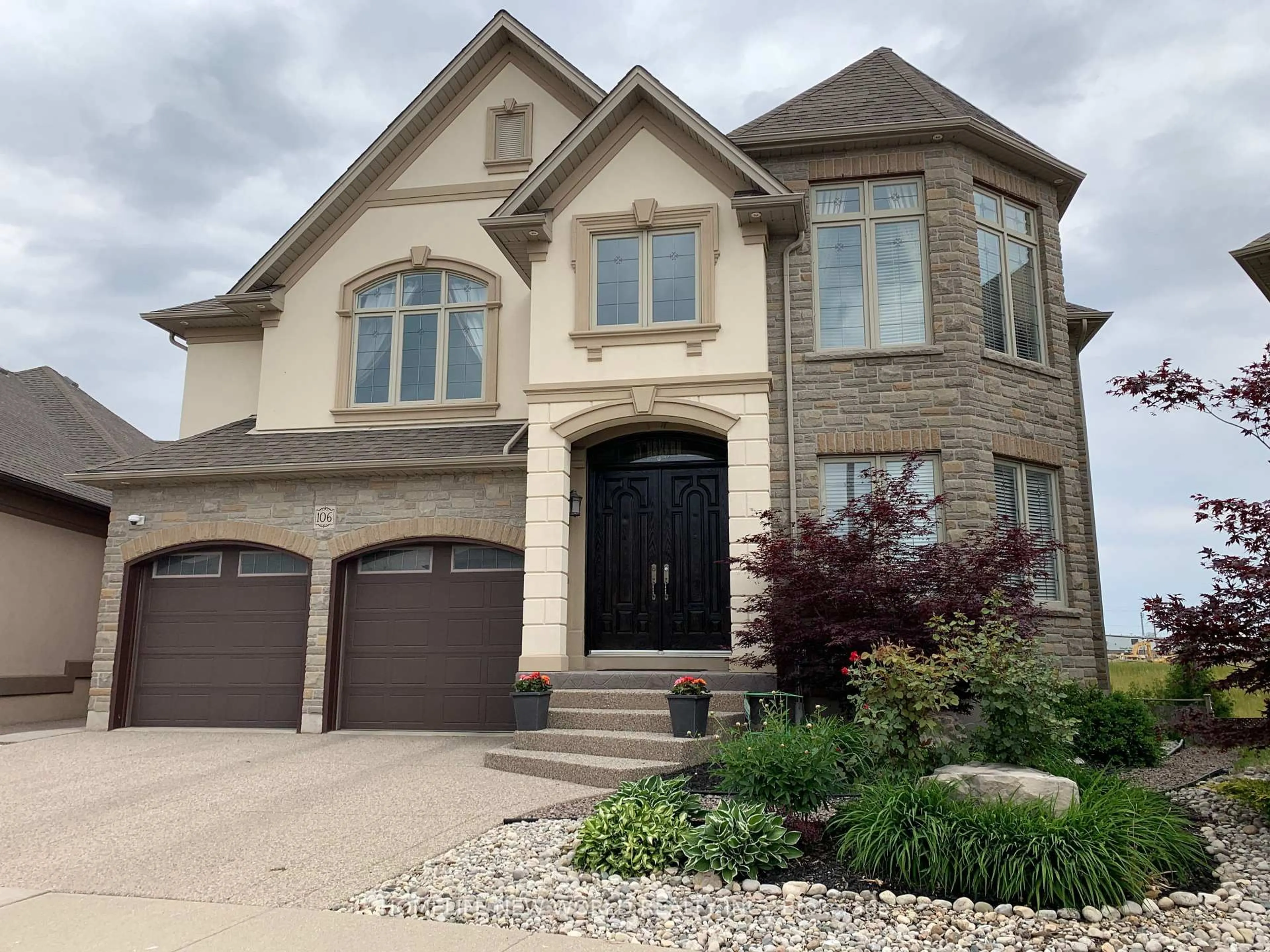 Home with brick exterior material, street for 106 Paige St, Kitchener Ontario N2K 4P6