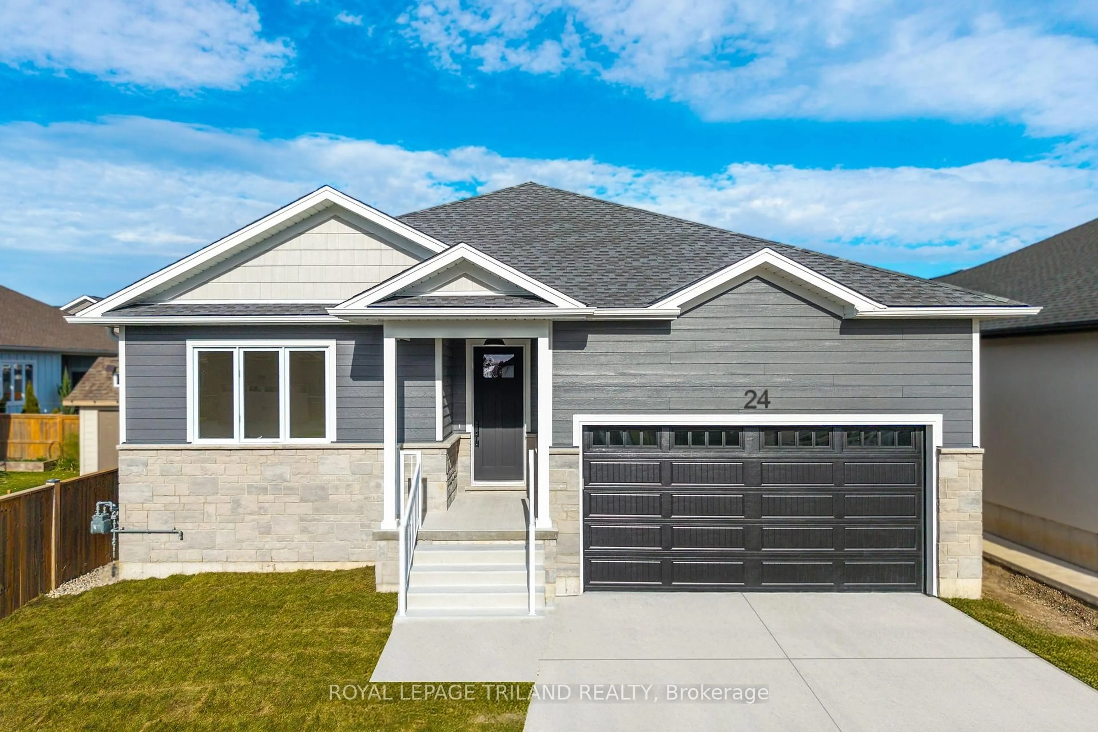 Home with vinyl exterior material, street for 24 Brooklawn Dr, Lambton Shores Ontario N0M 1T0