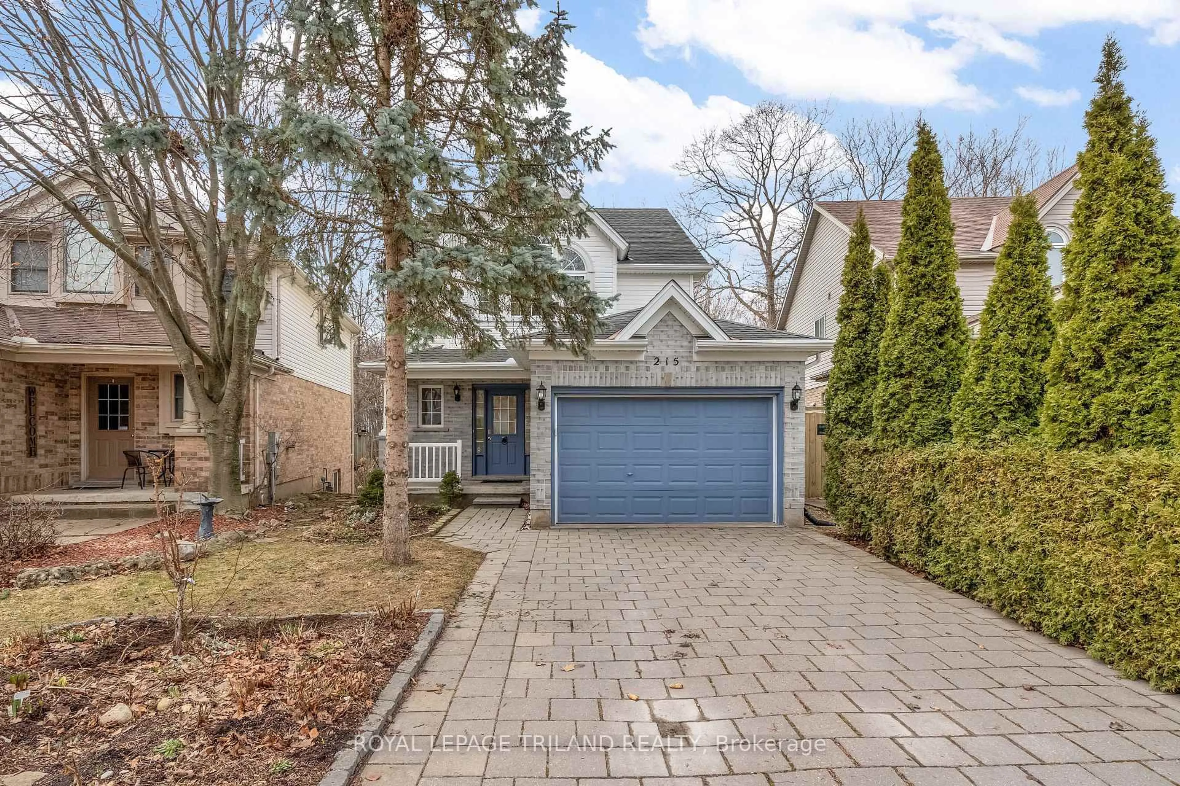 Home with brick exterior material, street for 215 Rossmore Crt, London South Ontario N6C 6B7