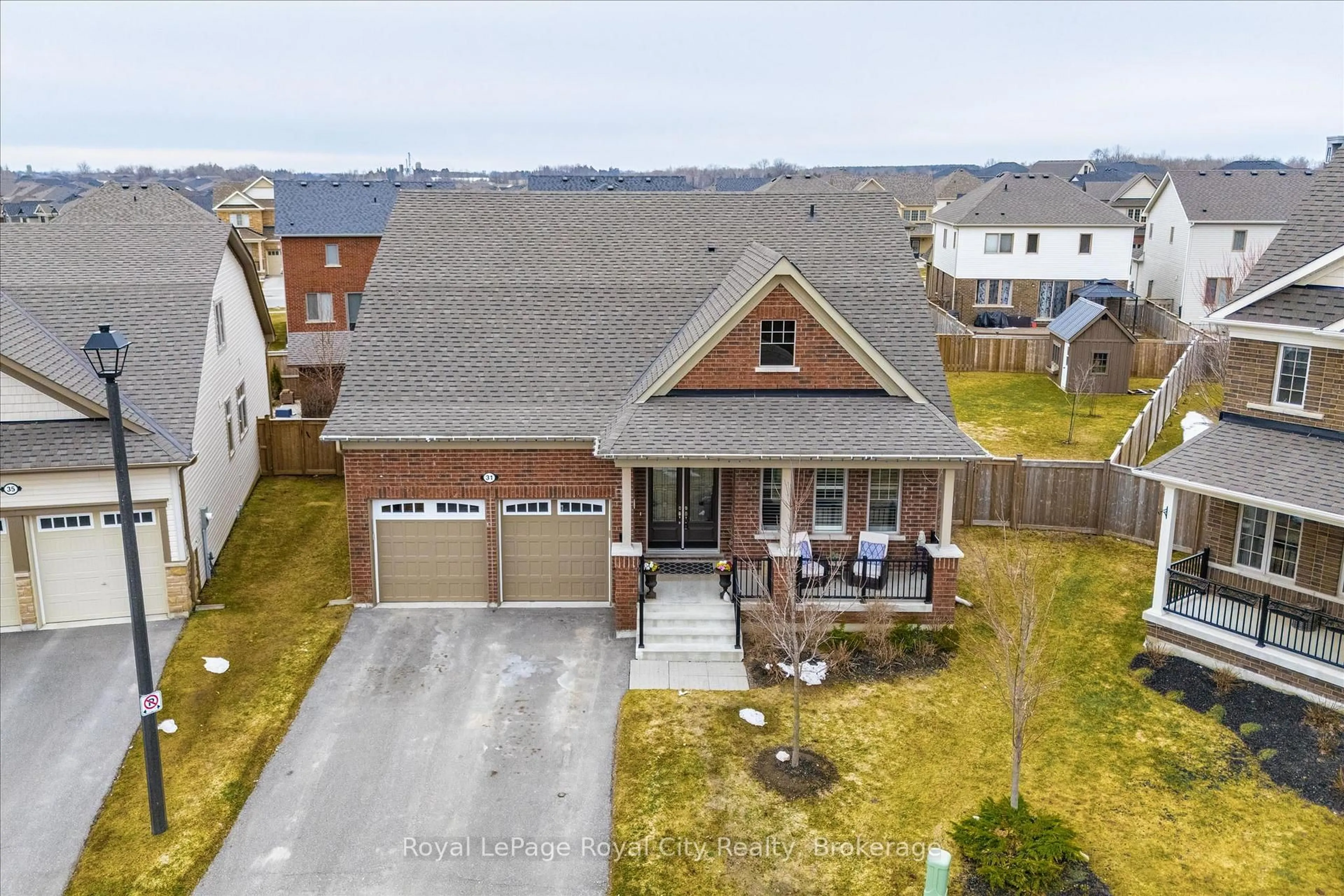 A pic from outside/outdoor area/front of a property/back of a property/a pic from drone, street for 31 Conlin Crt, Centre Wellington Ontario N1M 0H2