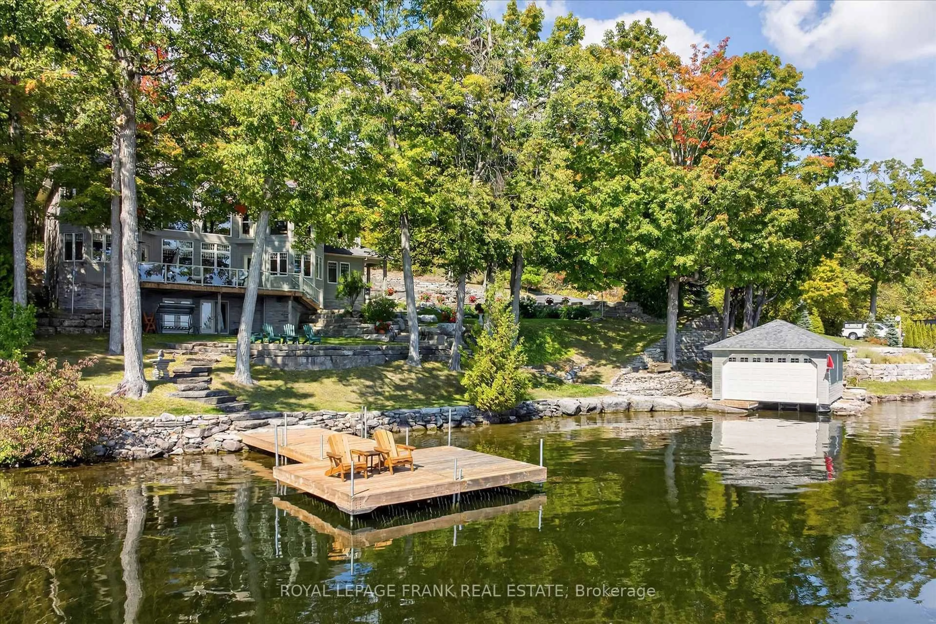 A pic from outside/outdoor area/front of a property/back of a property/a pic from drone, water/lake/river/ocean view for 3081 Beachwood Dr, Selwyn Ontario K0L 2H0