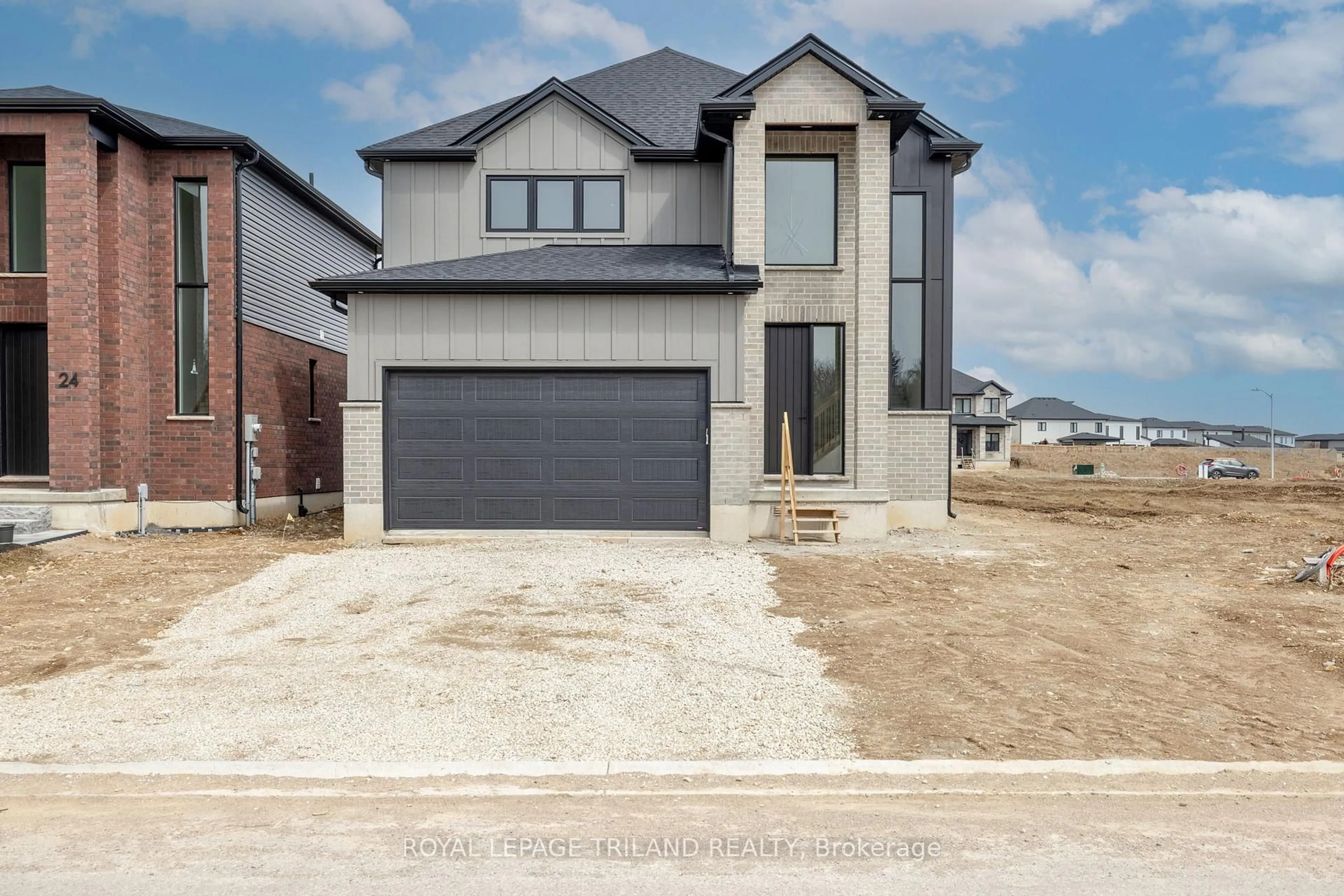 Home with brick exterior material, street for 28 Allister Dr, Middlesex Centre Ontario N0L 1R0