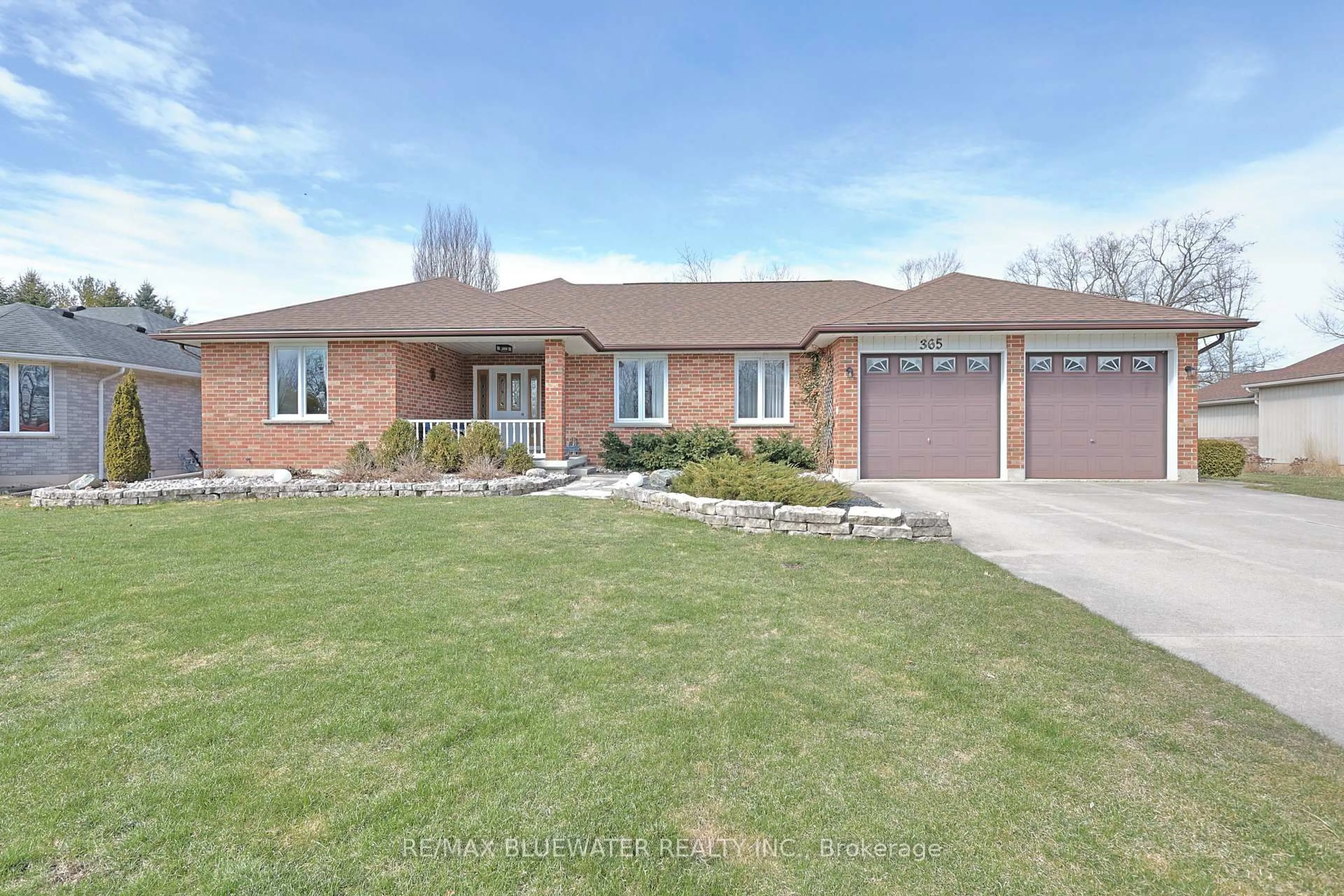 Home with brick exterior material, street for 365 Station St, North Middlesex Ontario N0M 2K0