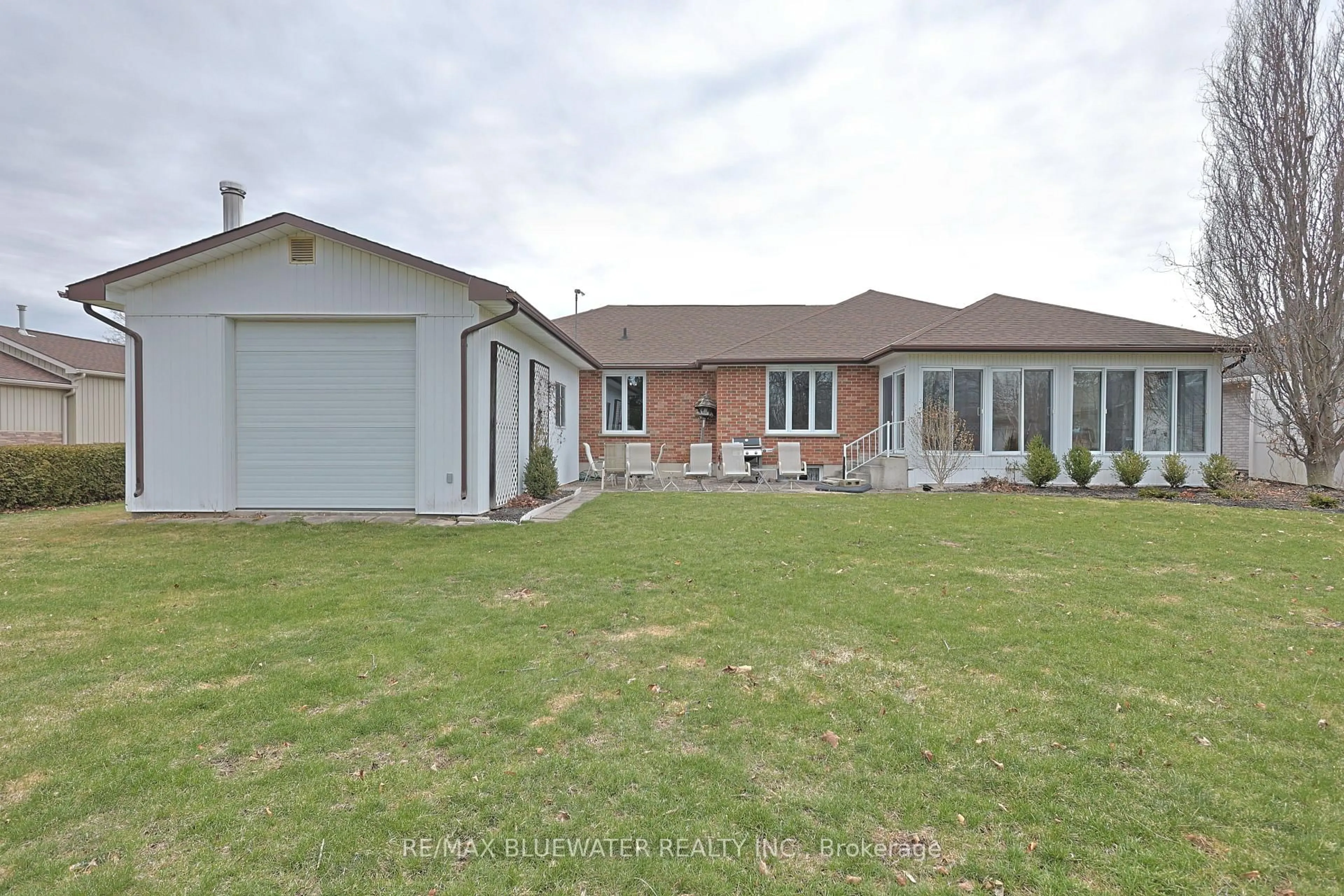 A pic from outside/outdoor area/front of a property/back of a property/a pic from drone, street for 365 Station St, North Middlesex Ontario N0M 2K0