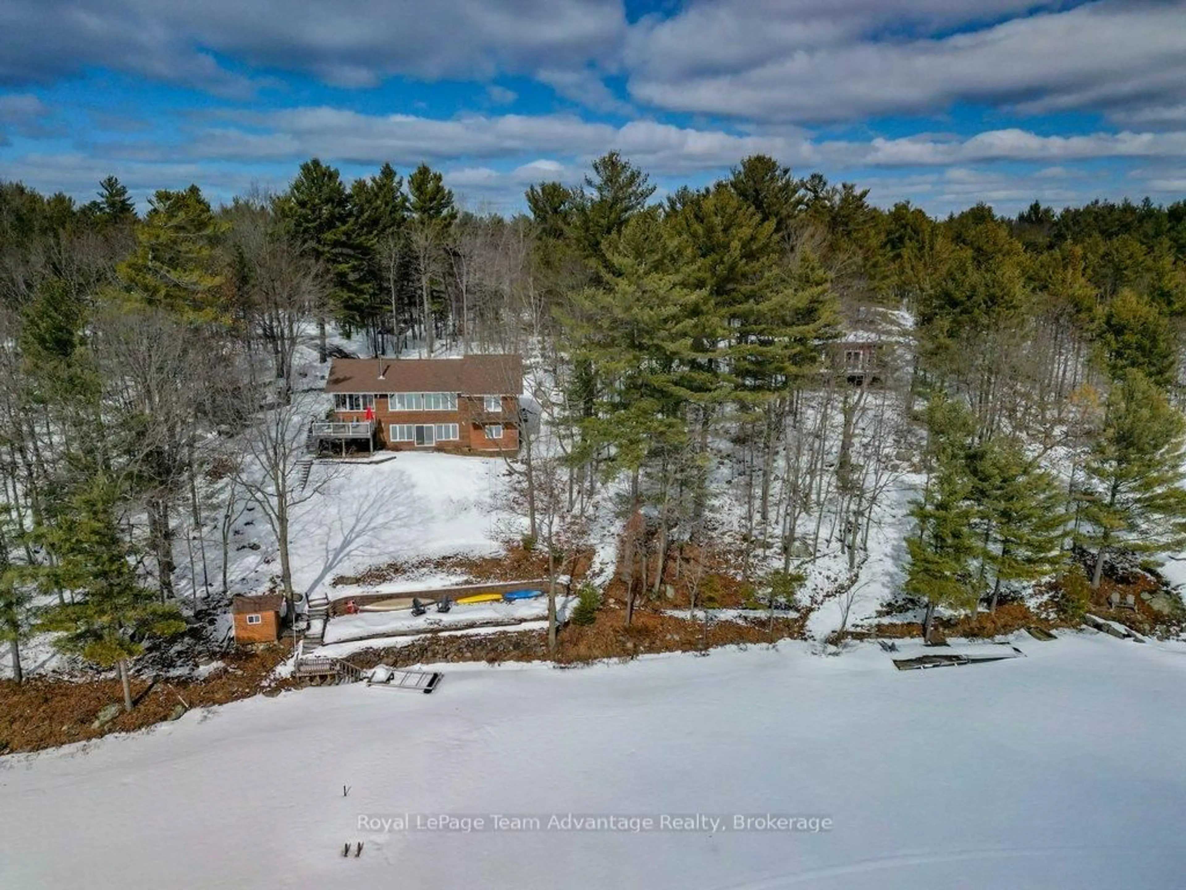 A pic from outside/outdoor area/front of a property/back of a property/a pic from drone, forest/trees view for 10 3rd Concession Rd, Carling Ontario P0G 1G0
