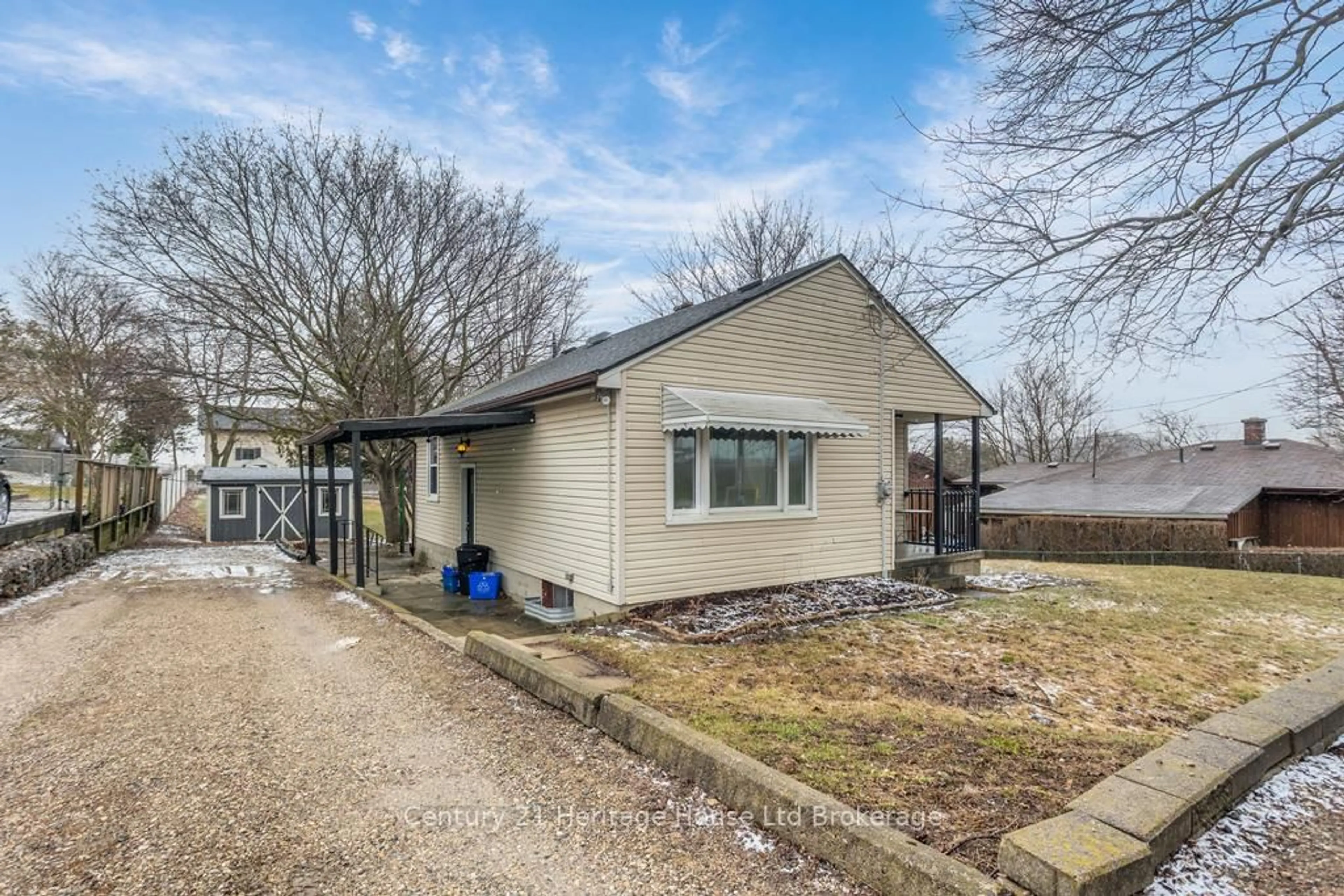 A pic from outside/outdoor area/front of a property/back of a property/a pic from drone, street for 544980 Pattullo Ave, Norwich Ontario N4S 7V8