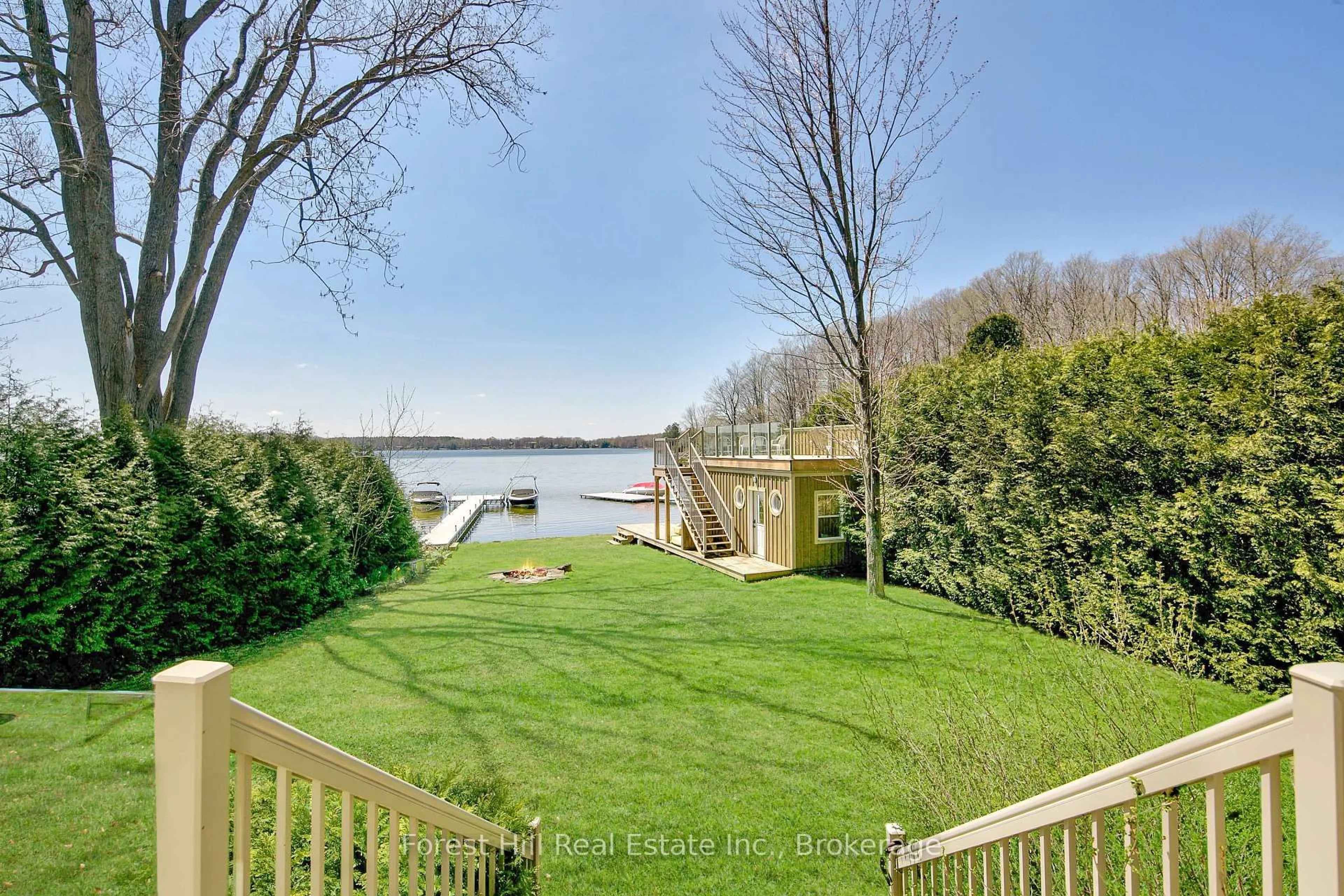 A pic from outside/outdoor area/front of a property/back of a property/a pic from drone, water/lake/river/ocean view for 222 Plantt's Point Rd, Grey Highlands Ontario N0C 1E0