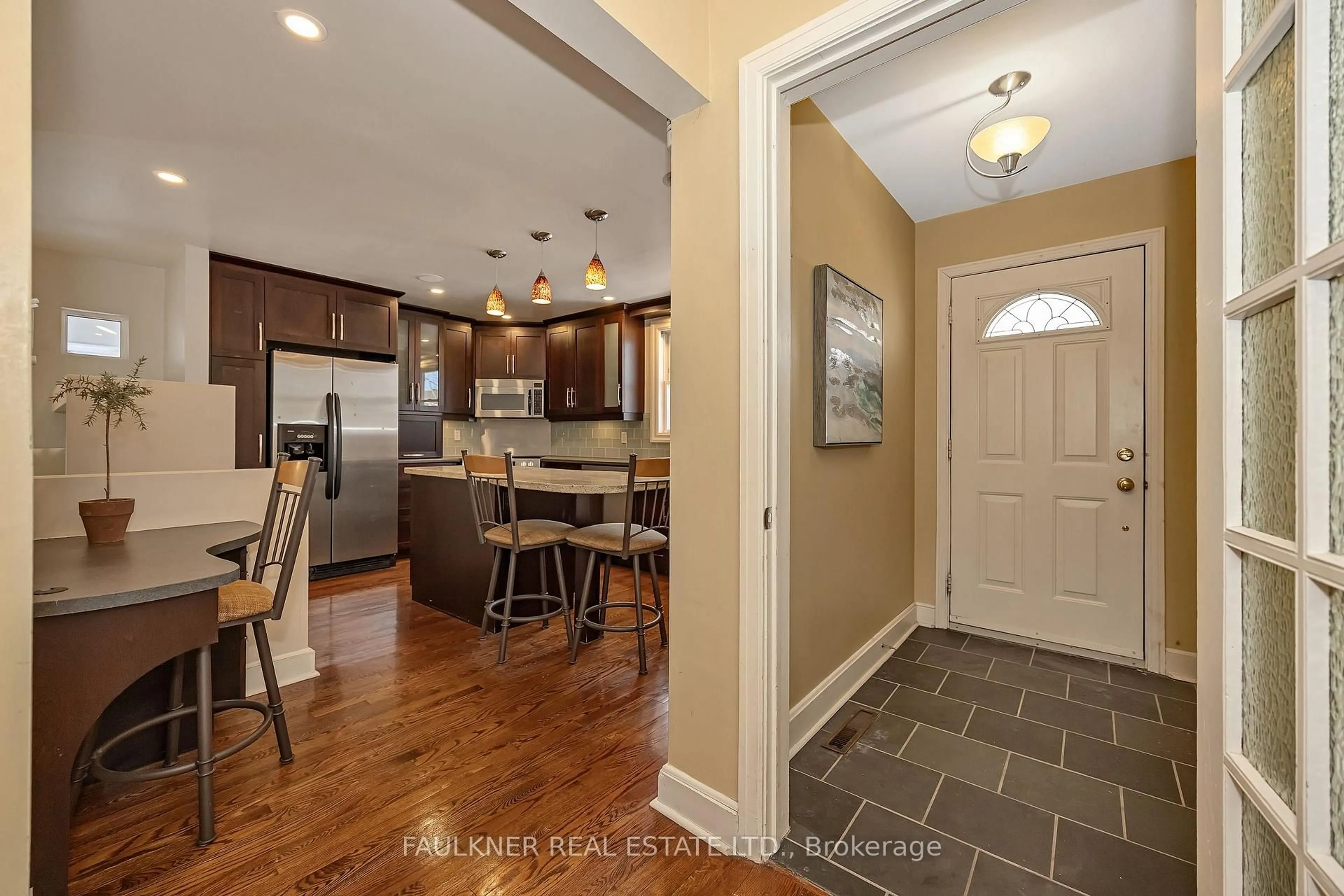Open concept kitchen, ceramic/tile floor for 573 Courtenay Ave, Ottawa Ontario K2A 3B4