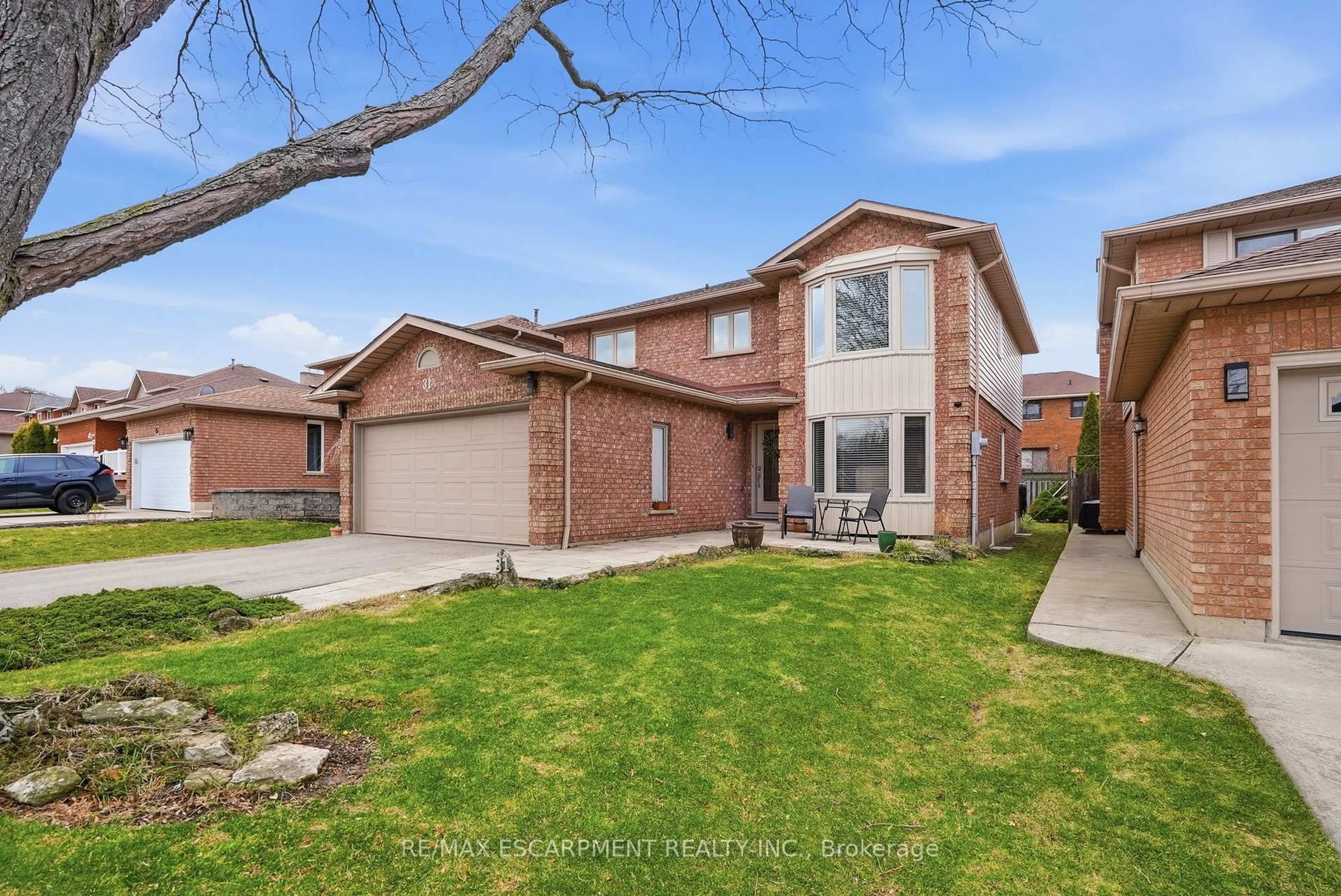 Home with brick exterior material, street for 31 Republic Ave, Hamilton Ontario L9B 2G6