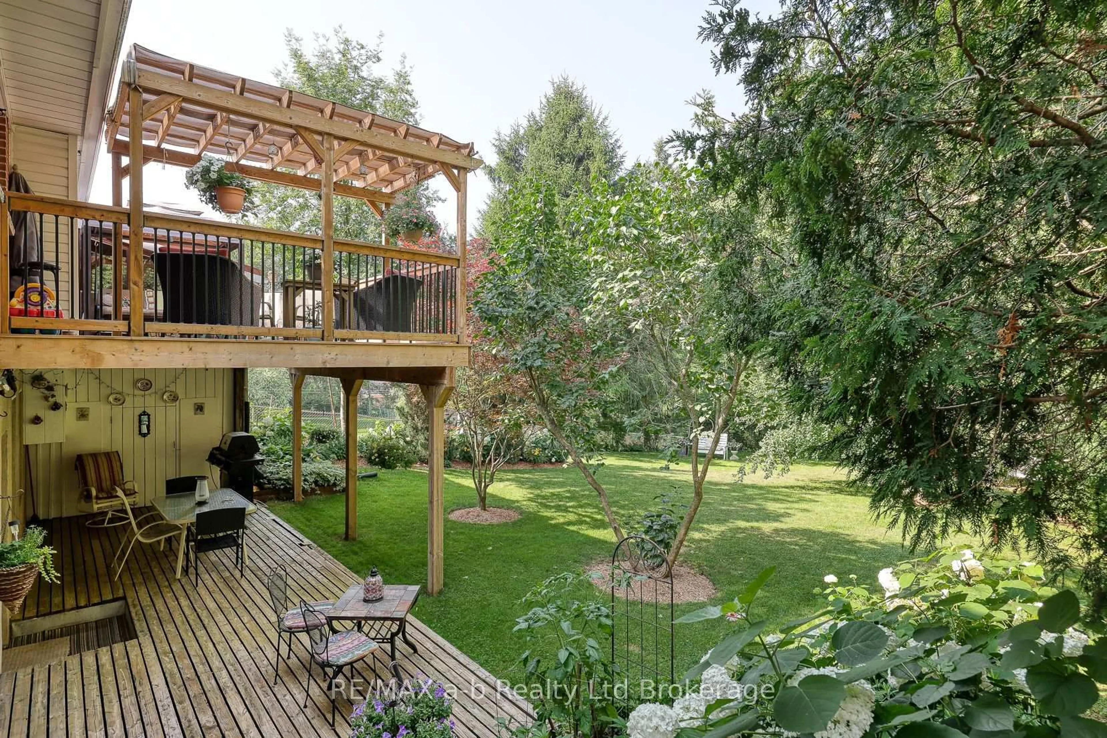 Patio, forest/trees view for 543 Highland Dr, Woodstock Ontario N4S 5X1