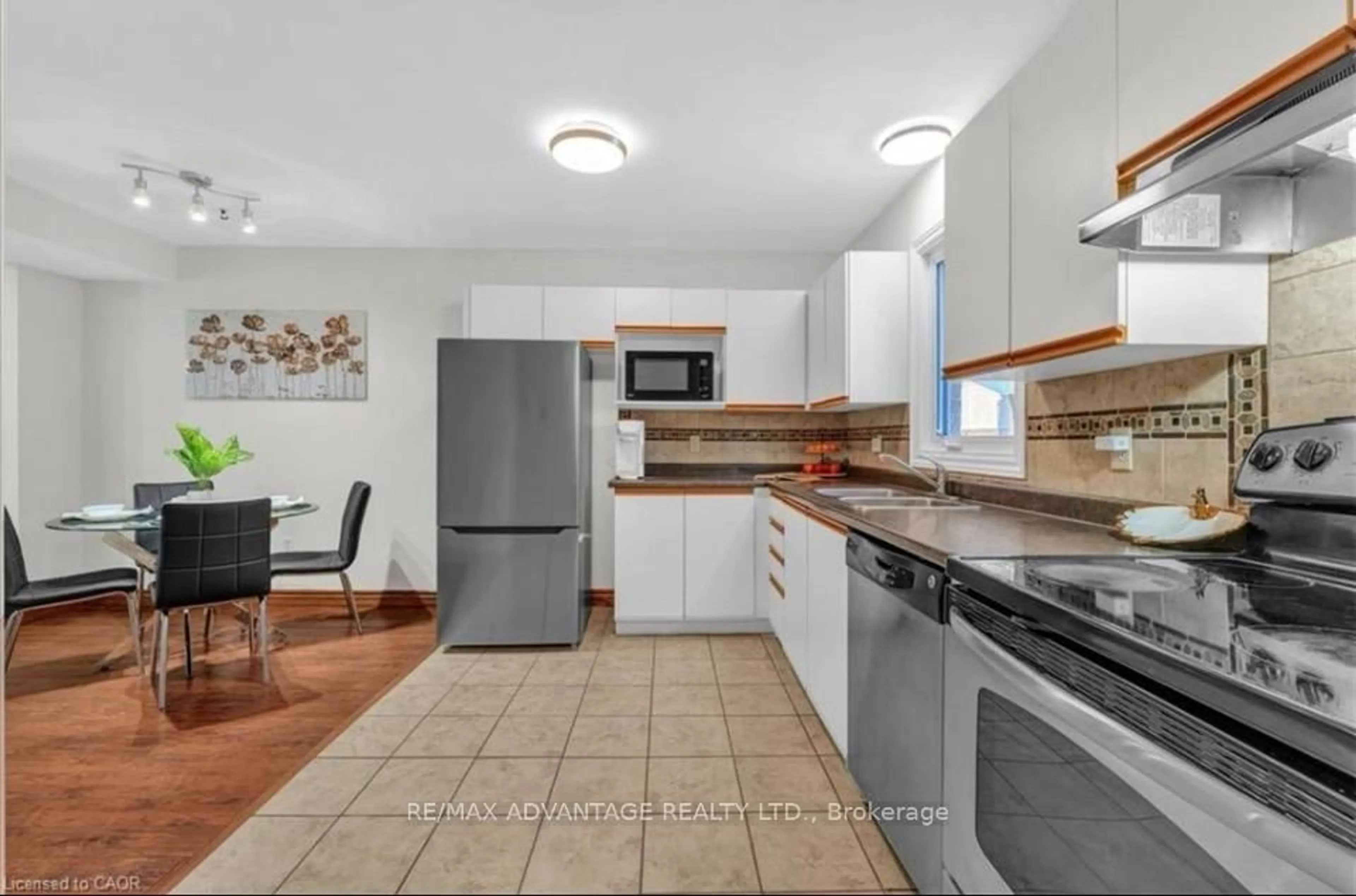 Standard kitchen, ceramic/tile floor for 217 Martinet Ave #17, London East Ontario N5V 4P5