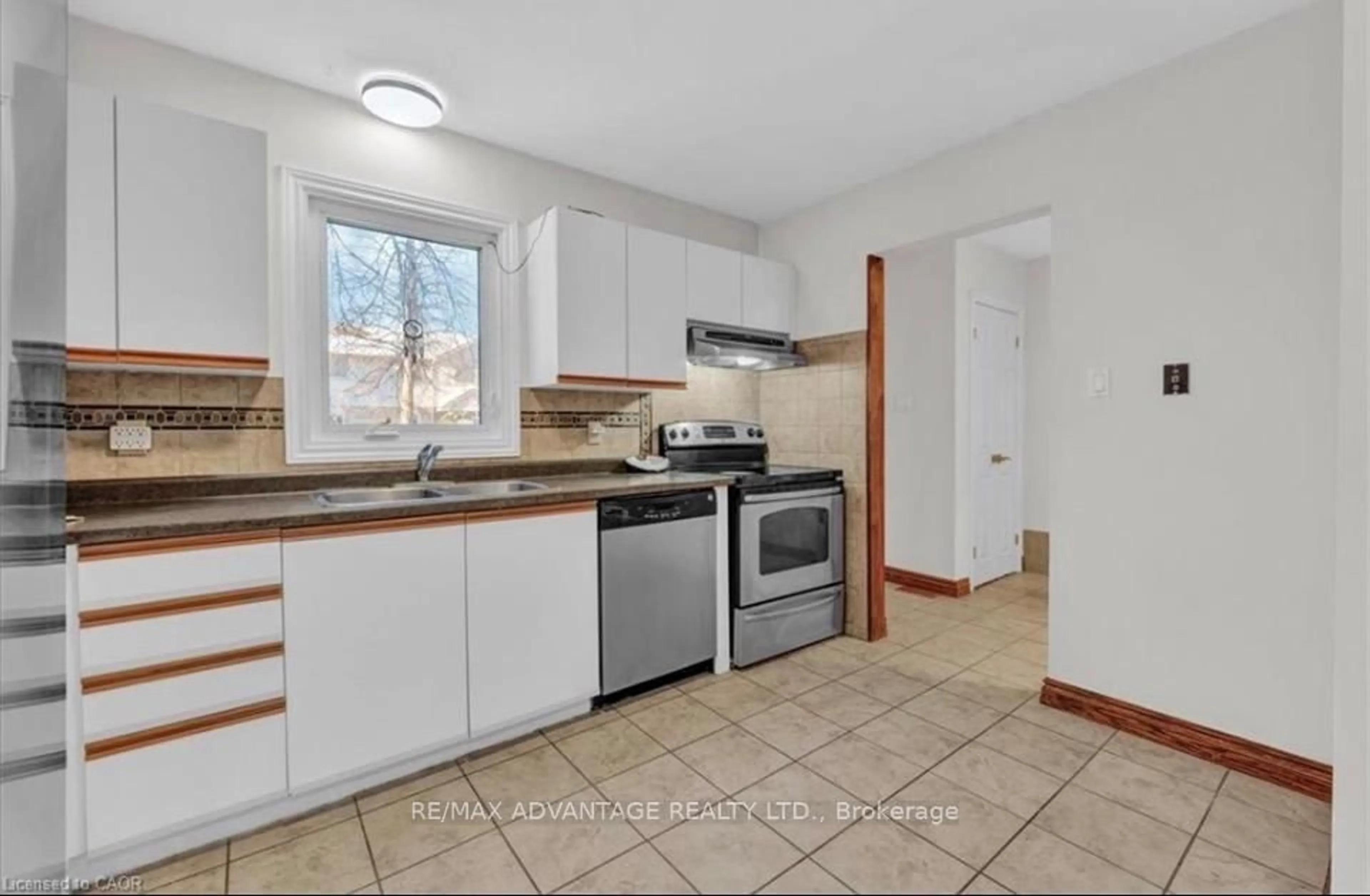 Standard kitchen, ceramic/tile floor for 217 Martinet Ave #17, London East Ontario N5V 4P5