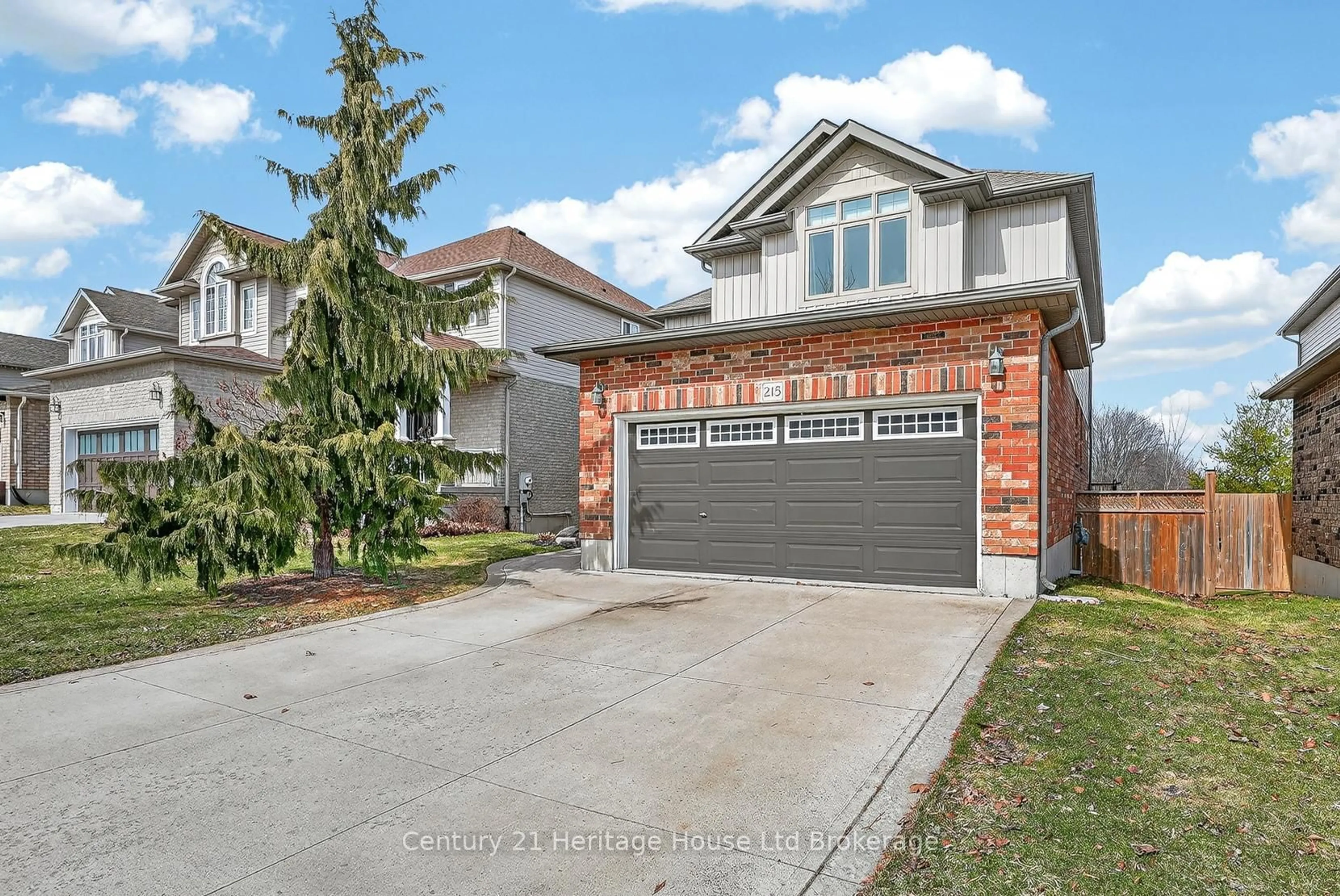 Home with brick exterior material, street for 215 Munnoch Blvd, Woodstock Ontario N4T 1V7