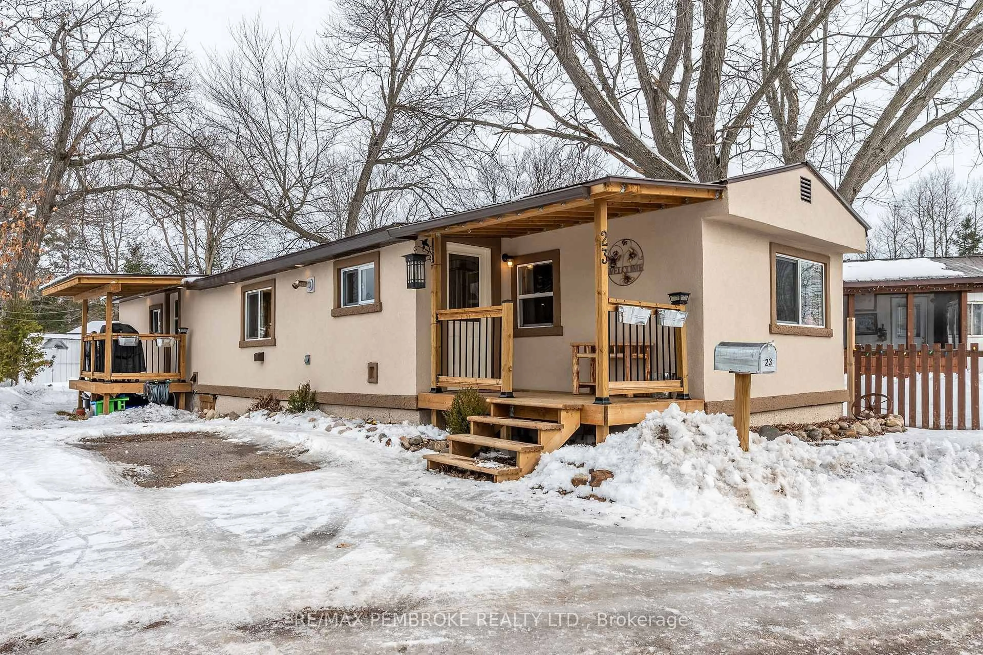 Home with vinyl exterior material, street for 23 Pinehurst Estates, Petawawa Ontario K8H 2H2