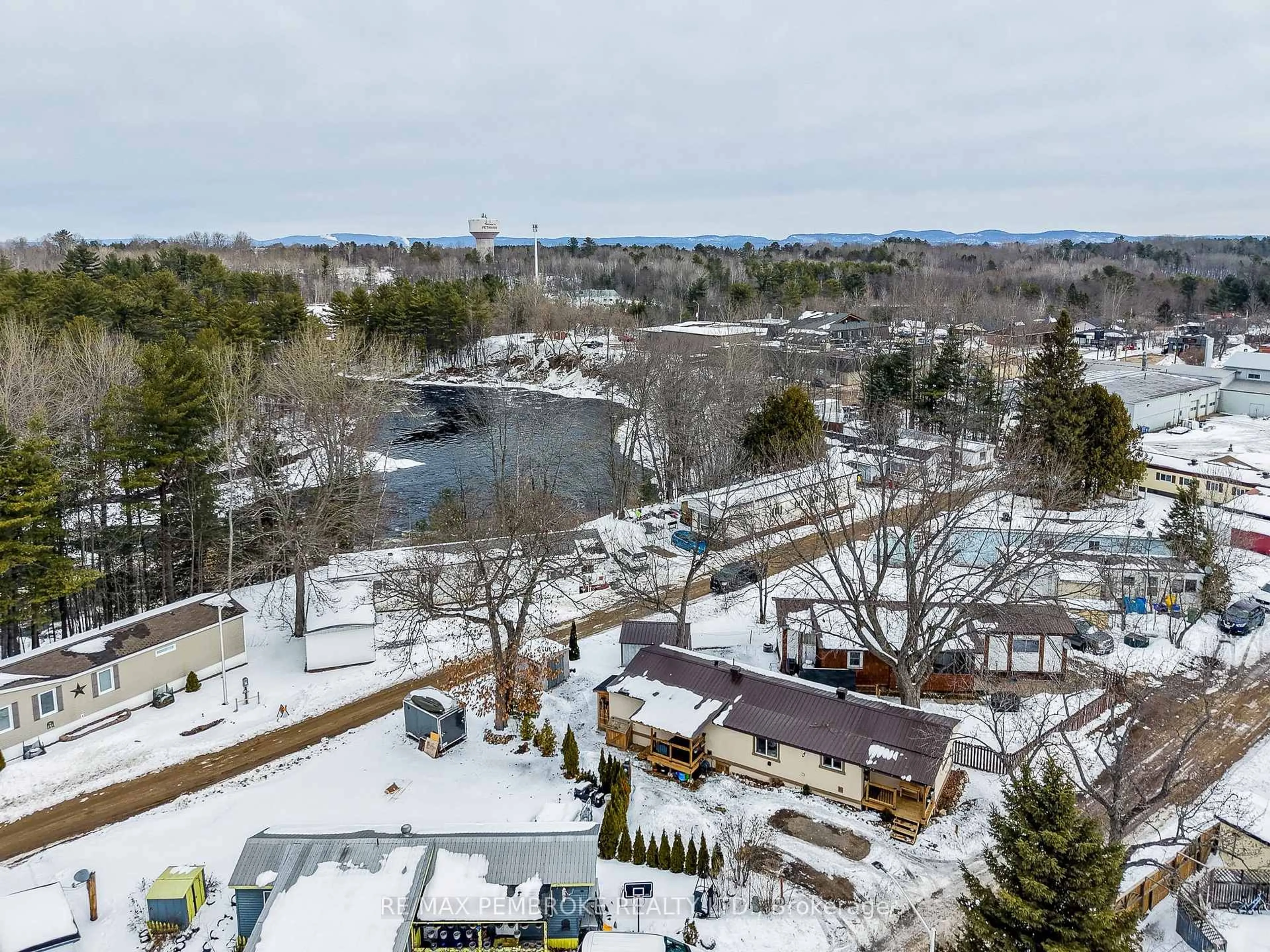 A pic from outside/outdoor area/front of a property/back of a property/a pic from drone, water/lake/river/ocean view for 23 Pinehurst Estates, Petawawa Ontario K8H 2H2