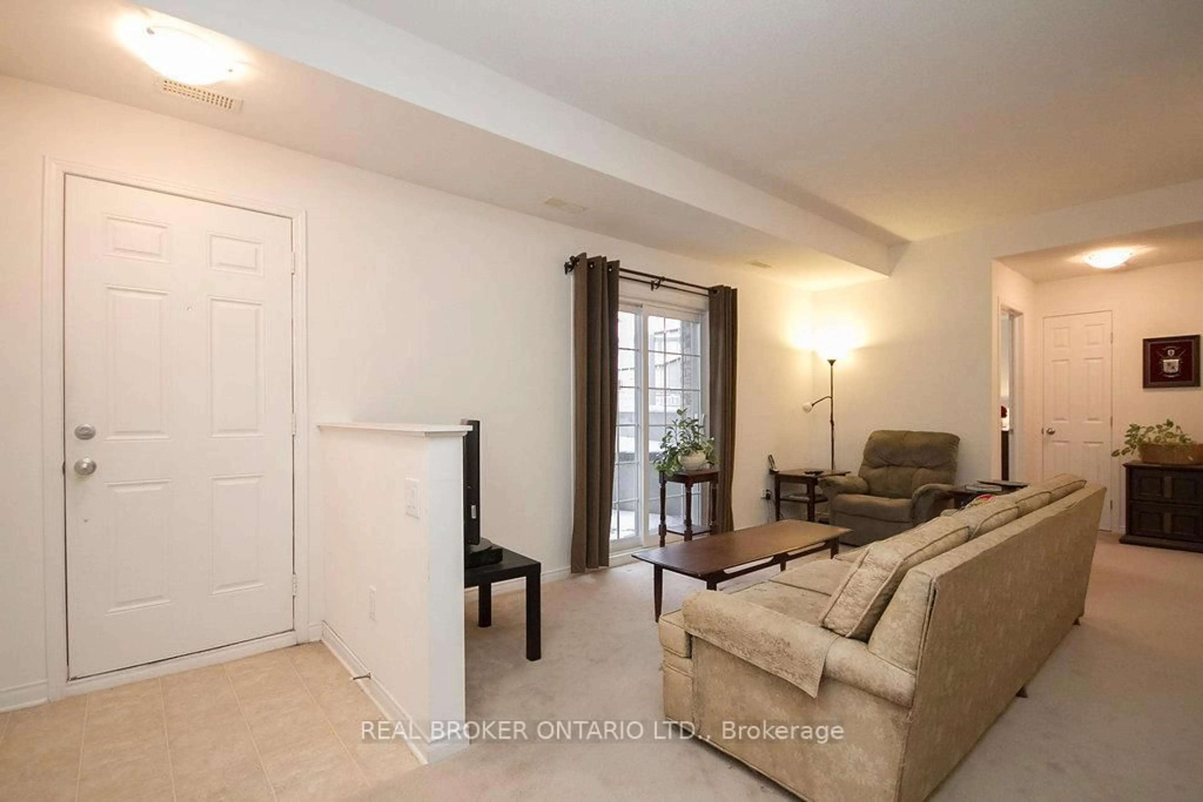 Living room with furniture, unknown for 101 Artesa Private #G, Ottawa Ontario K2S 0J8