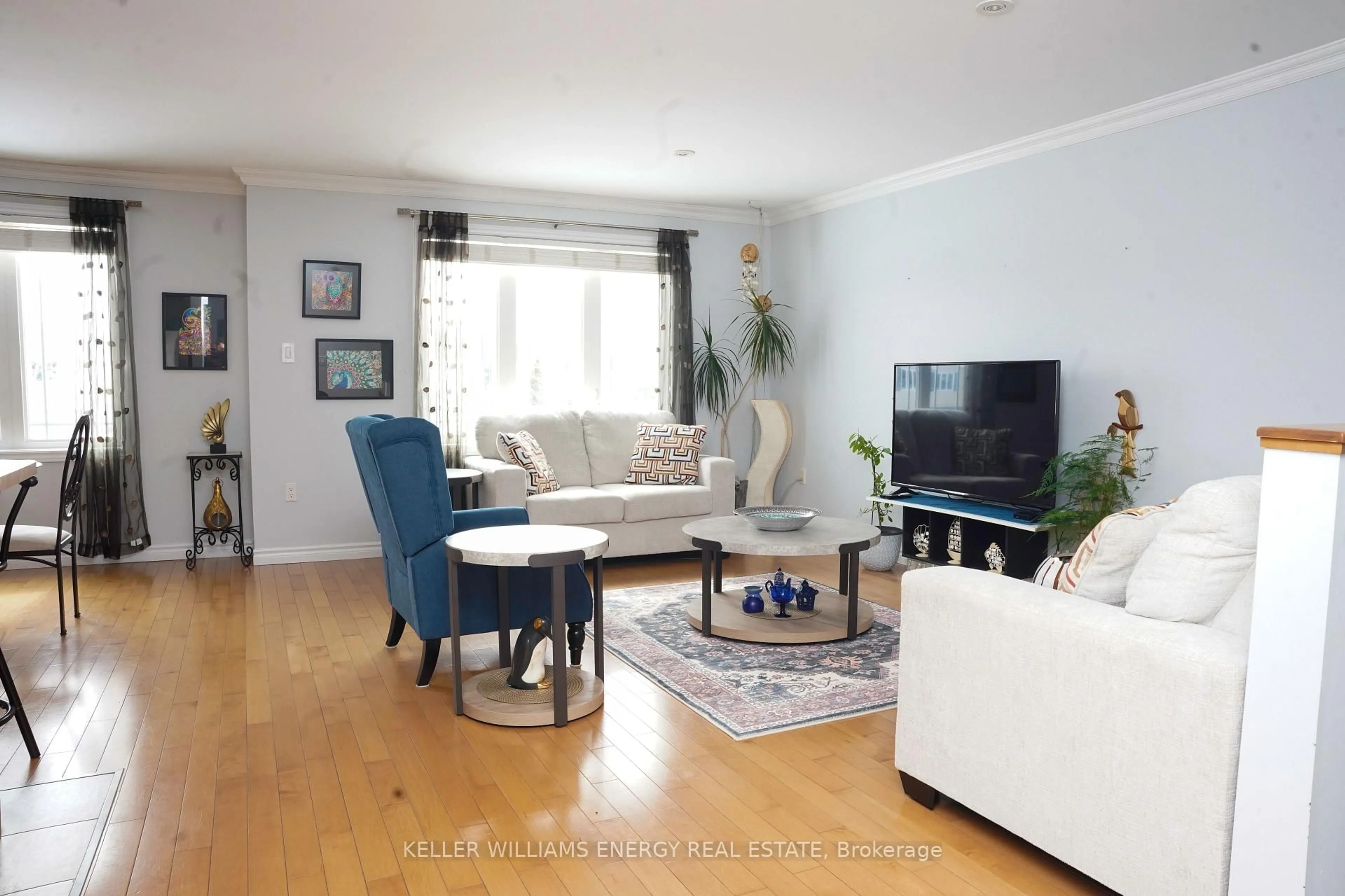 Living room with furniture, wood/laminate floor for 11 Morning Star St, Petawawa Ontario K8H 0A1