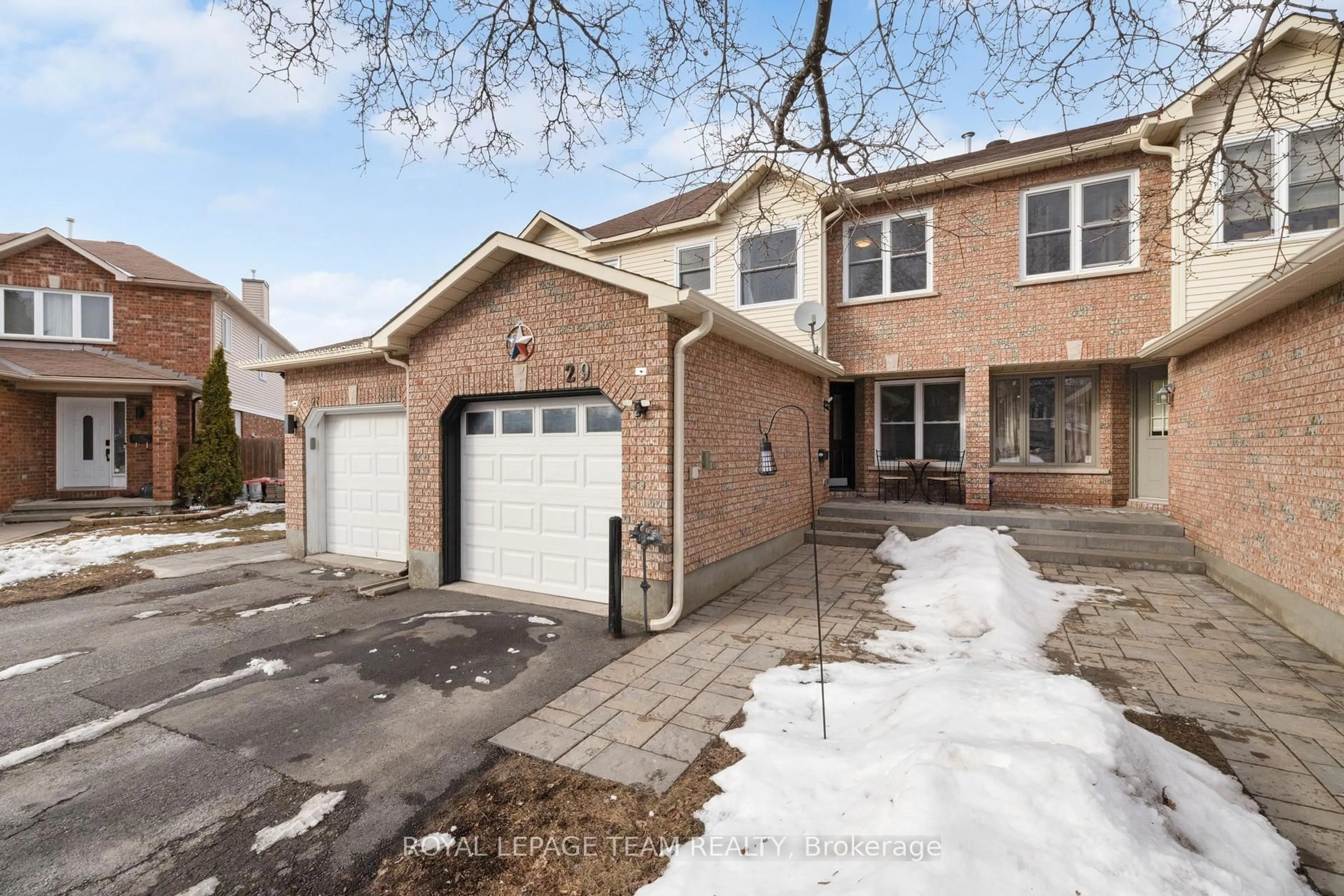 Home with brick exterior material, street for 29 Grenadier Way, Ottawa Ontario K2J 4L3