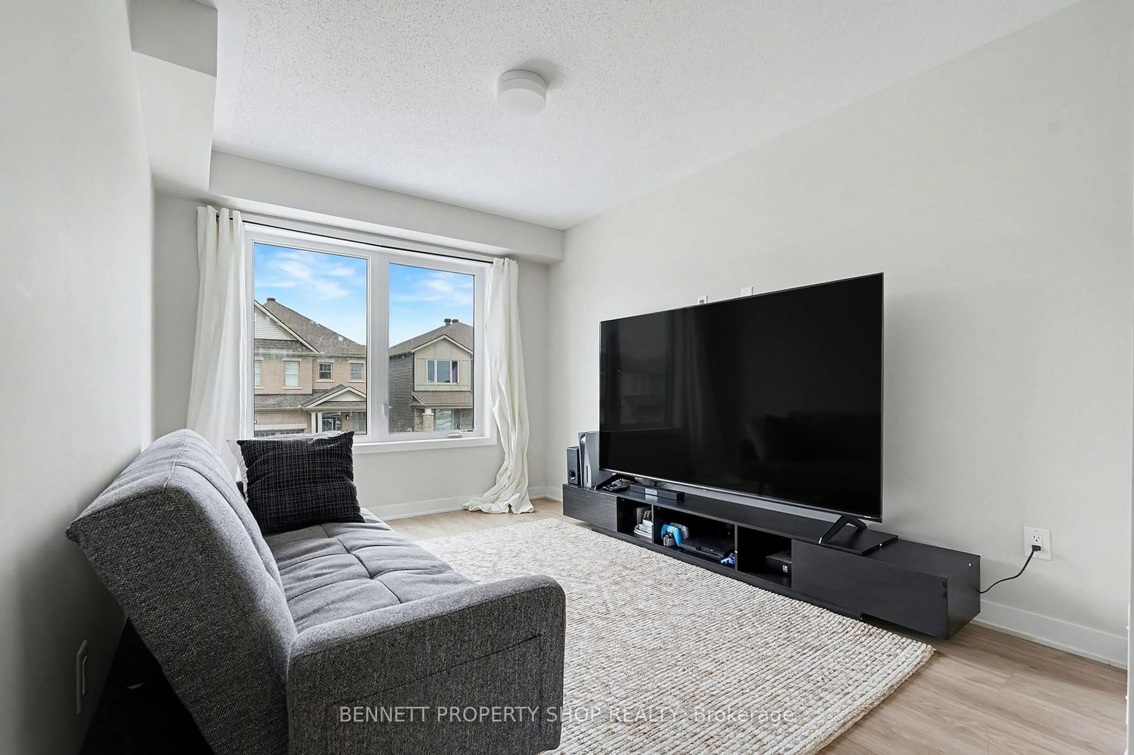 Living room with furniture, unknown for 2412 Watercolours Way, Ottawa Ontario K2J 7A9