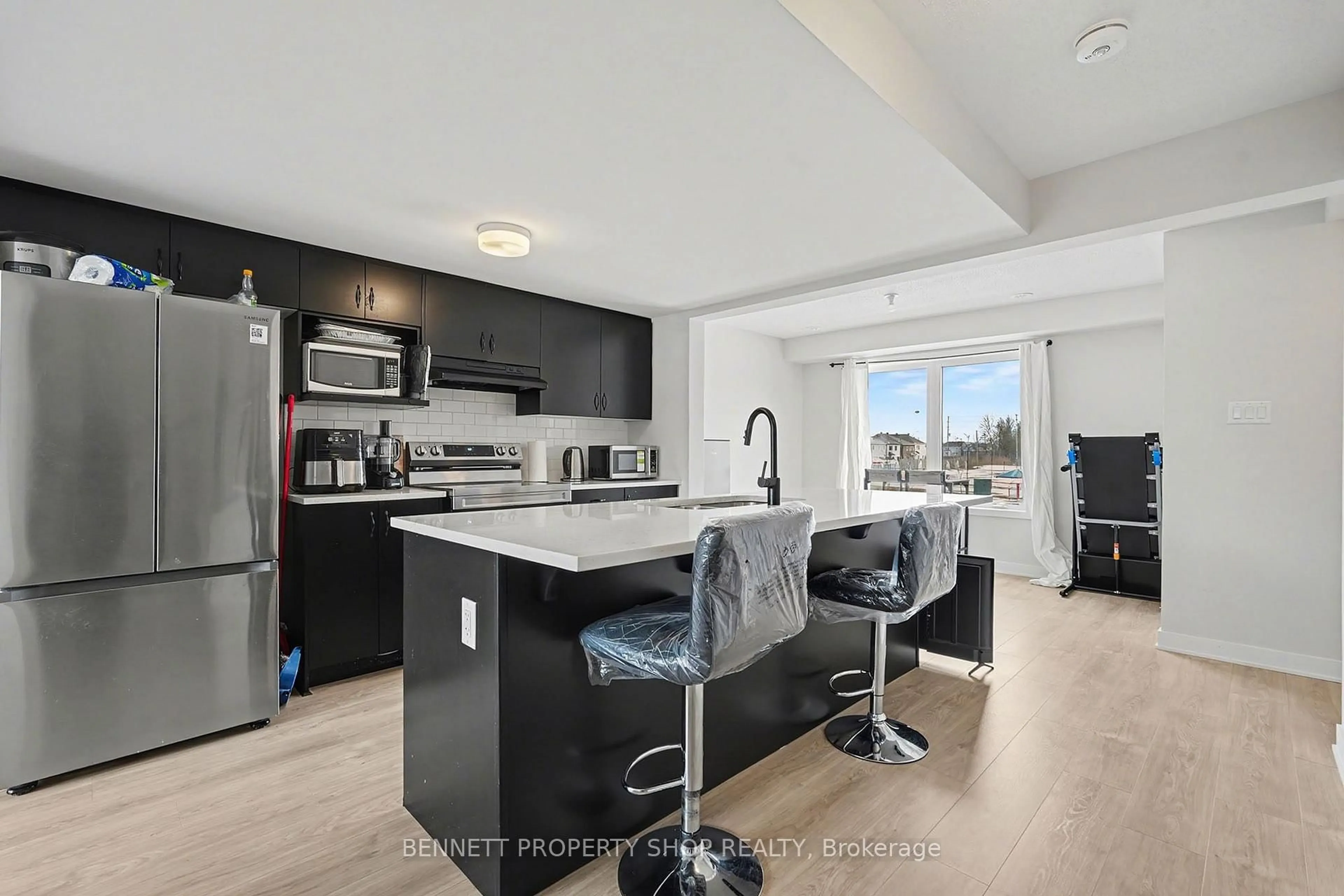 Open concept kitchen, unknown for 2412 Watercolours Way, Ottawa Ontario K2J 7A9