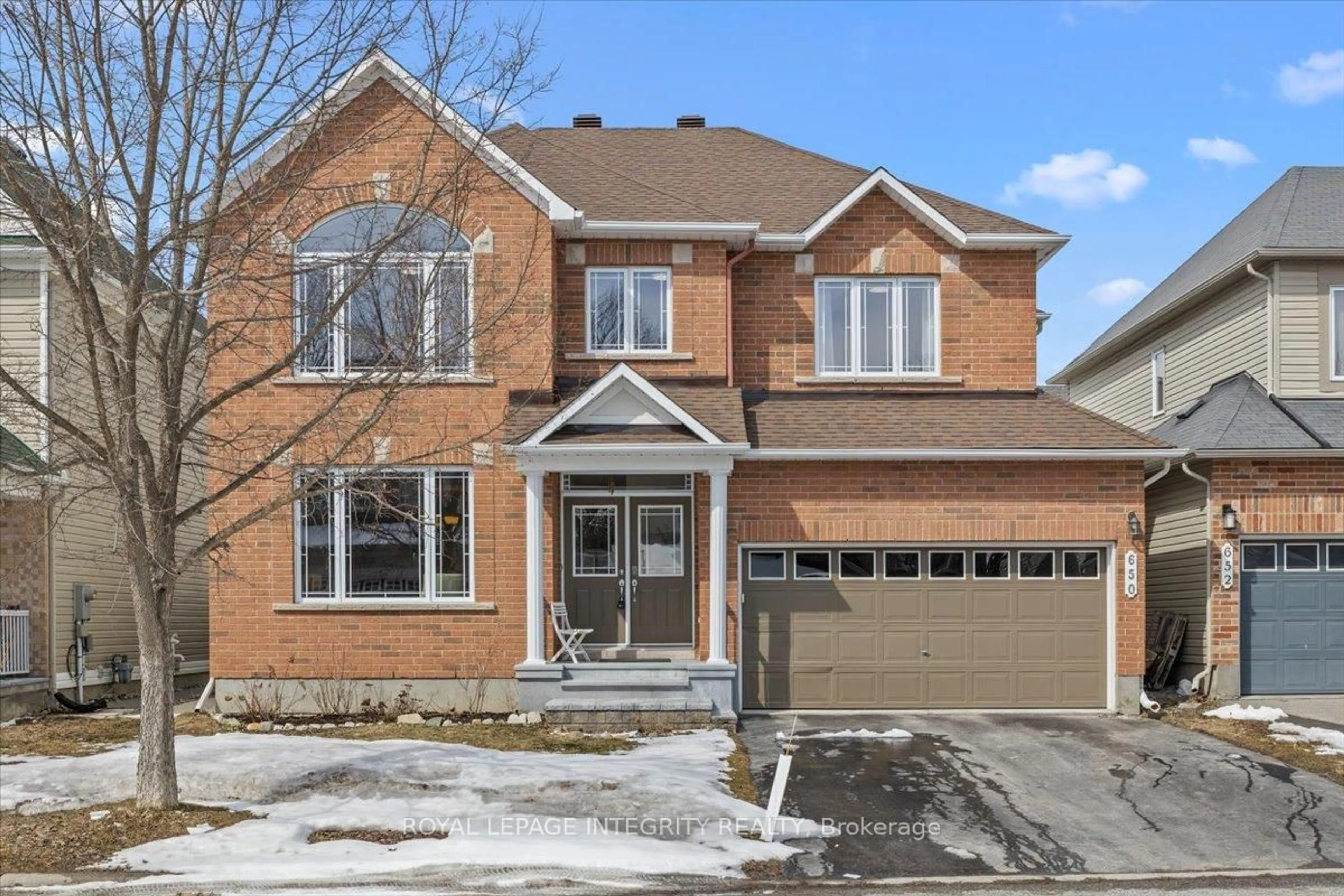 Home with brick exterior material, street for 650 New Liskeard Cres, Ottawa Ontario K2J 0N3