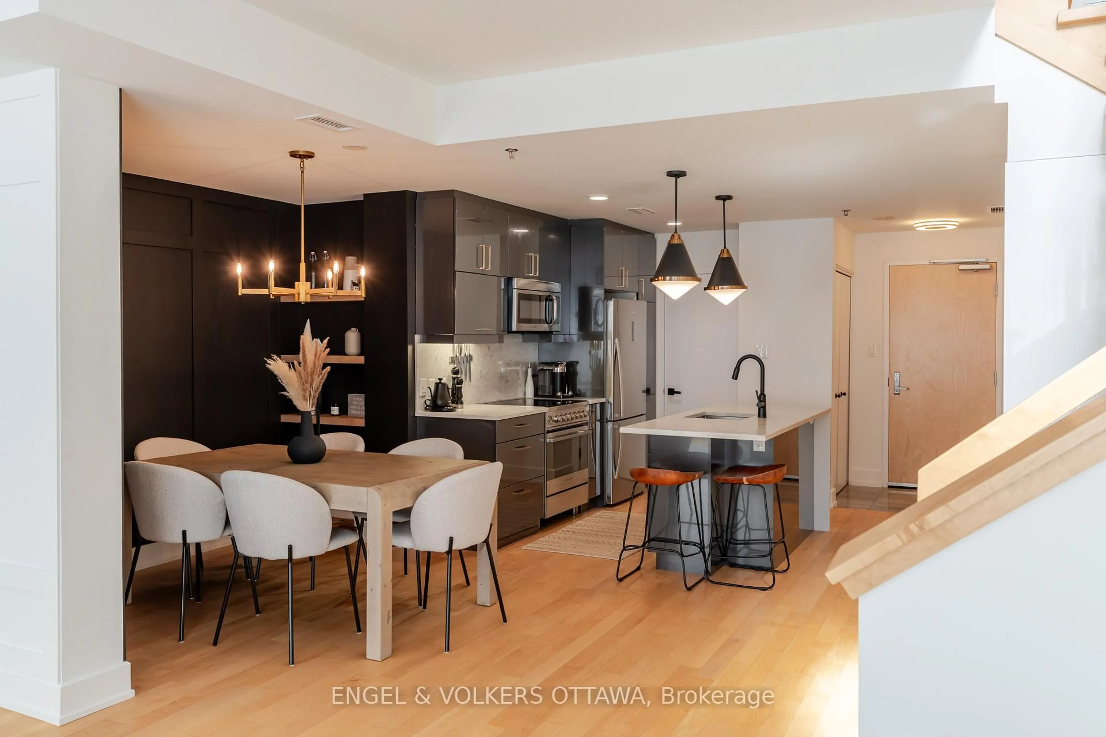 Open concept kitchen, wood/laminate floor for 197 Lisgar St #218, Ottawa Ontario K2P 0X5