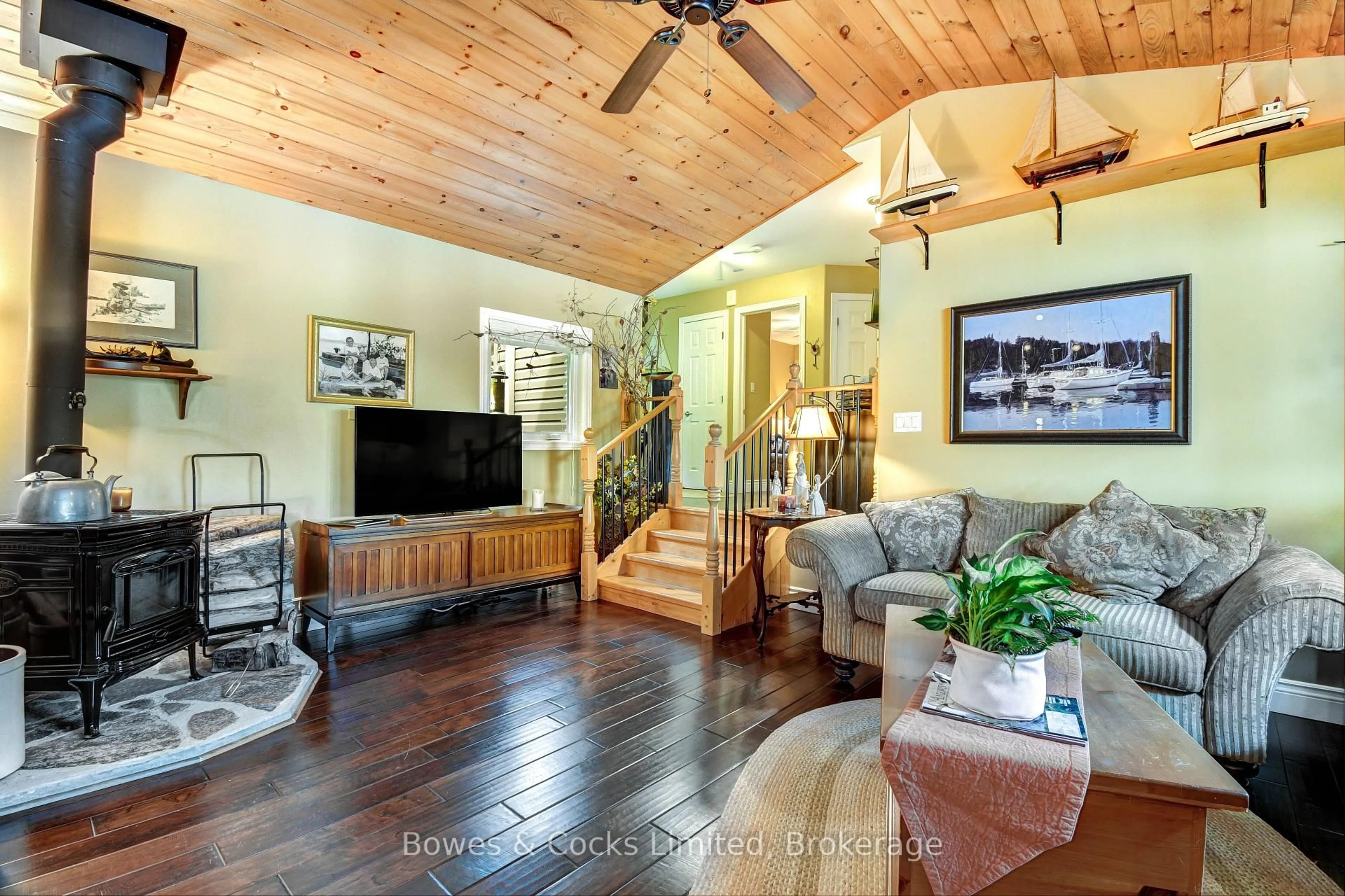 Living room with furniture, wood/laminate floor for 754 Renwick Rd, North Kawartha Ontario K0L 1A0